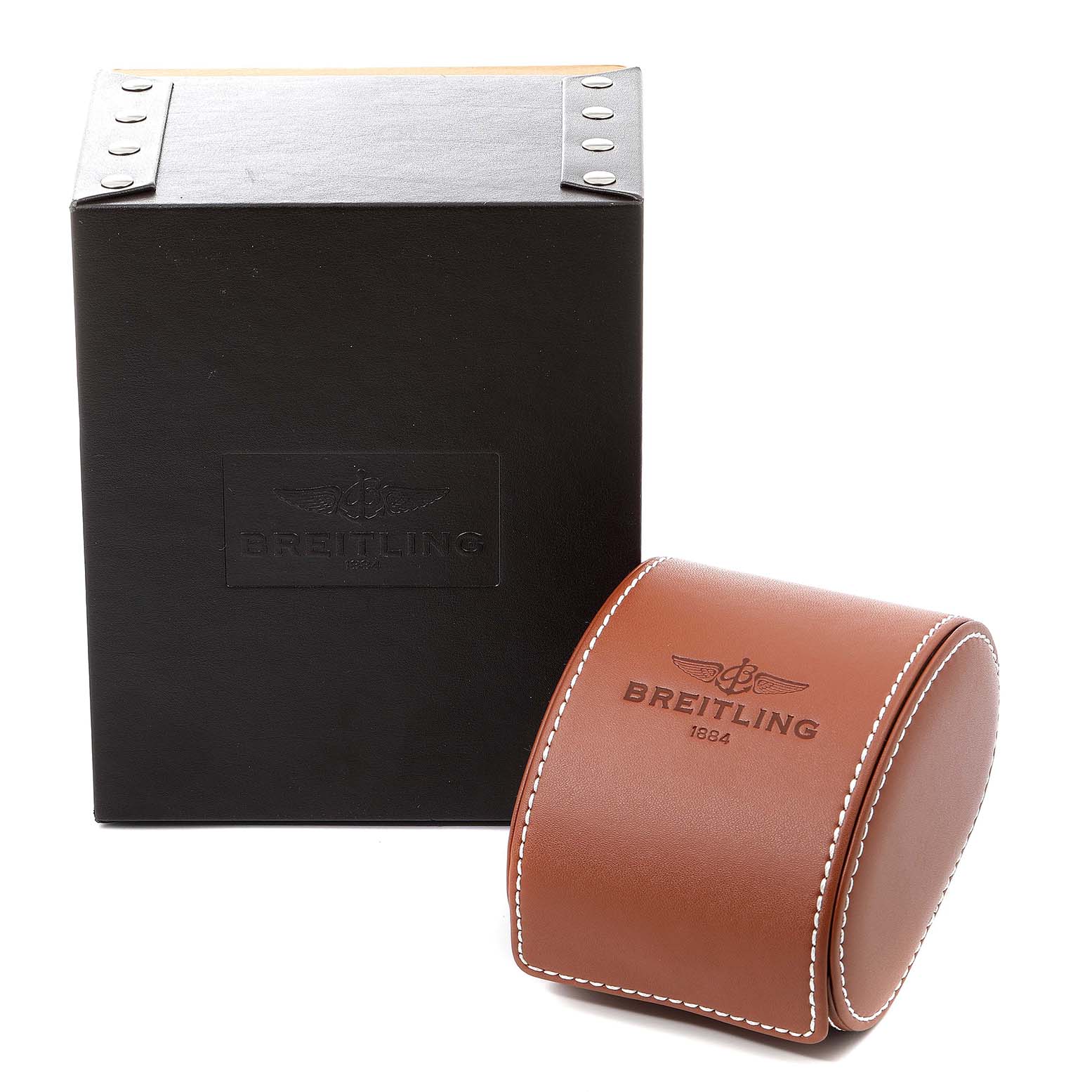 The image shows a black Breitling watch box and a brown Breitling watch case for the Avenger model.