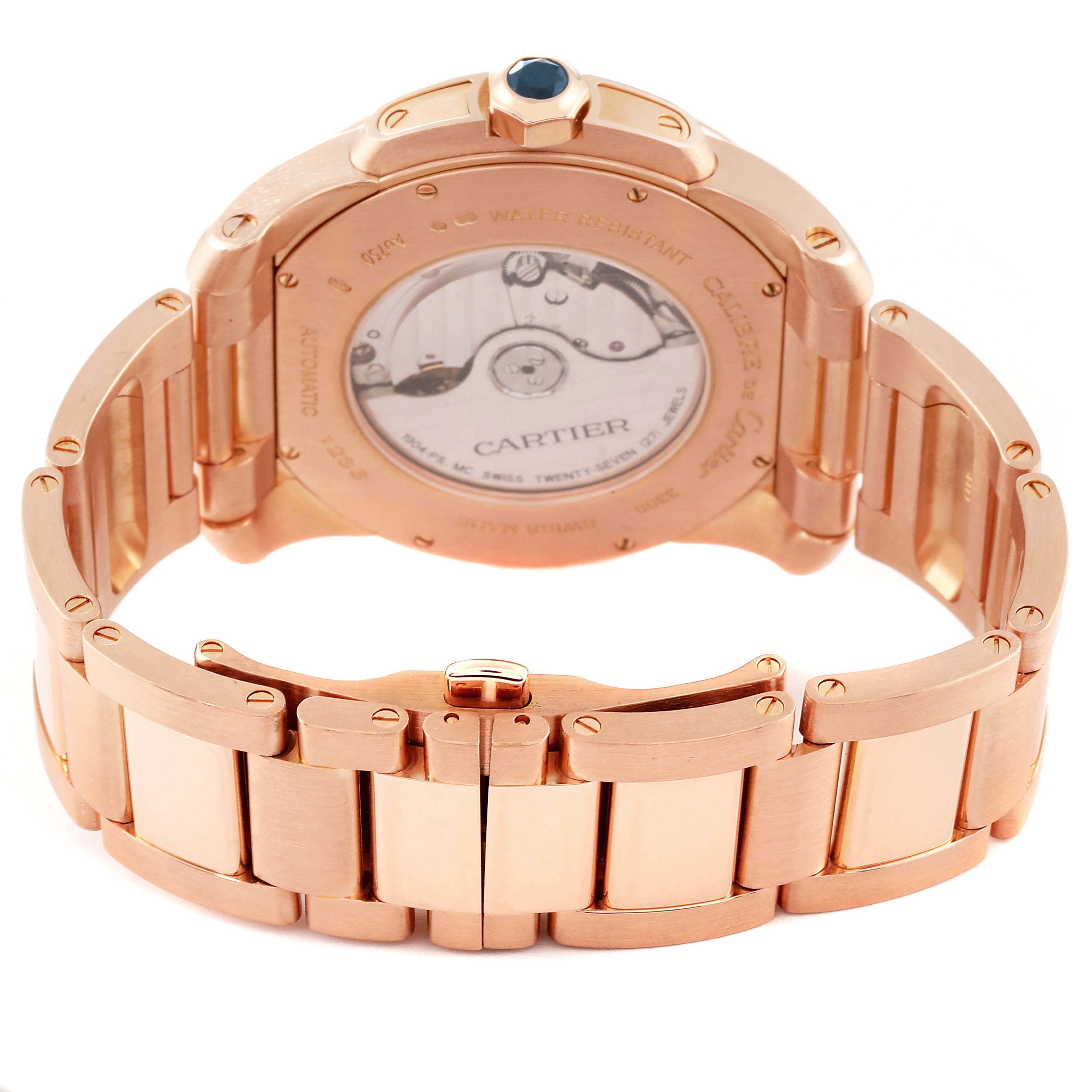 The image shows the back view of a Calibre de Cartier watch by Cartier, highlighting its bracelet and case back.
