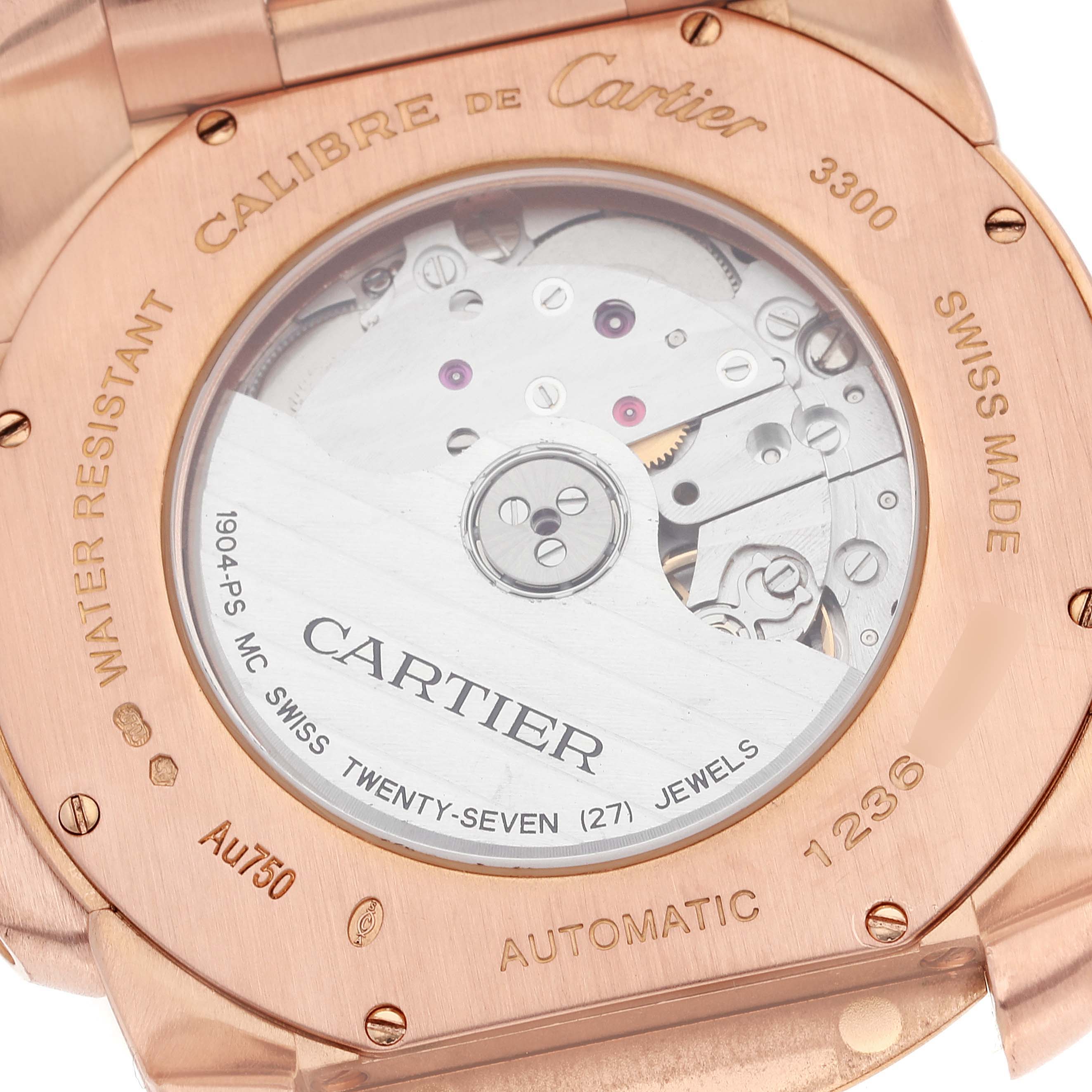 This image shows the open case back of the Calibre de Cartier model by Cartier, revealing its automatic movement.
