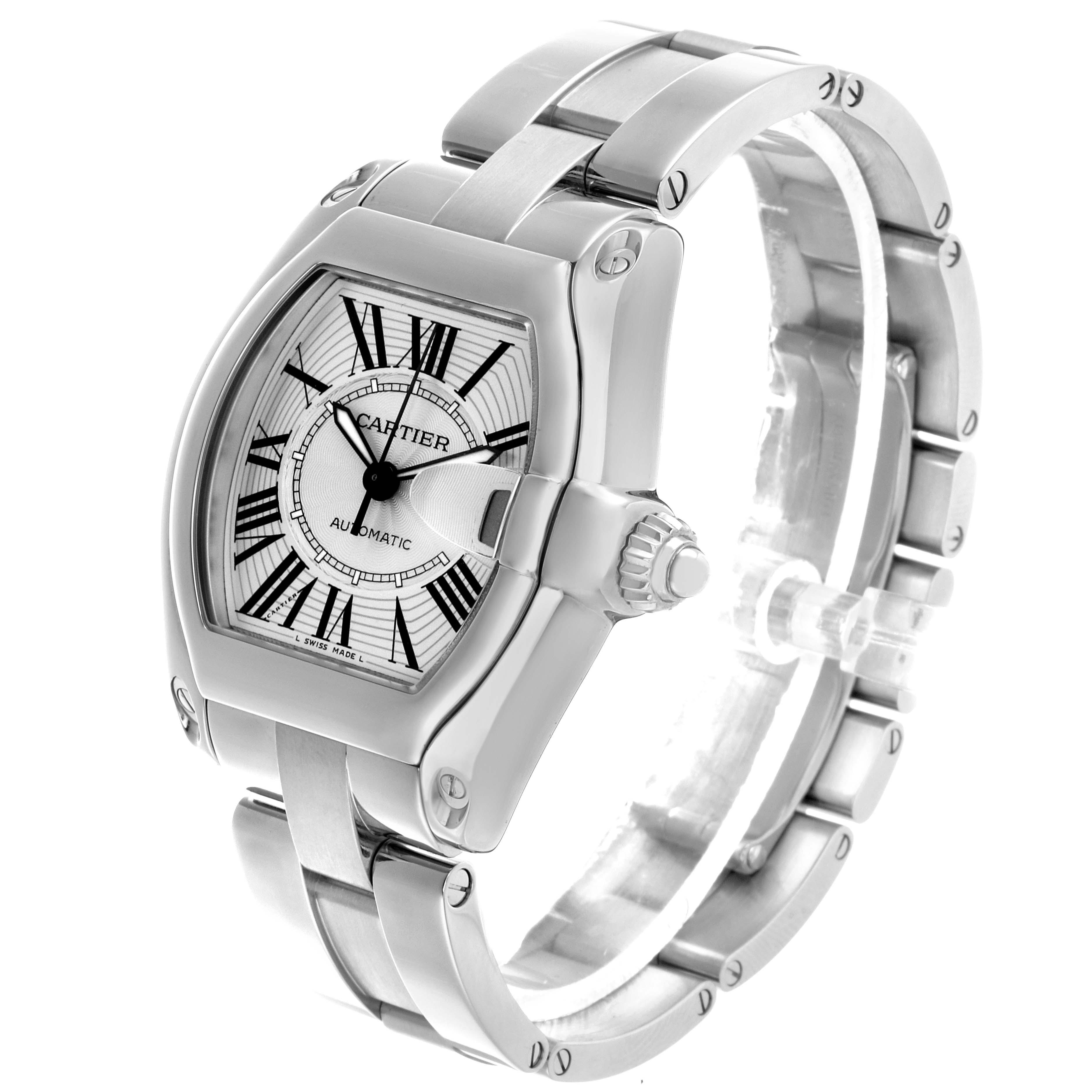 The Cartier Roadster W62025V3 Men's Stainless Steel Silver Dial watch is shown at a three-quarter angle, displaying the dial, bezel, and part of the bracelet.