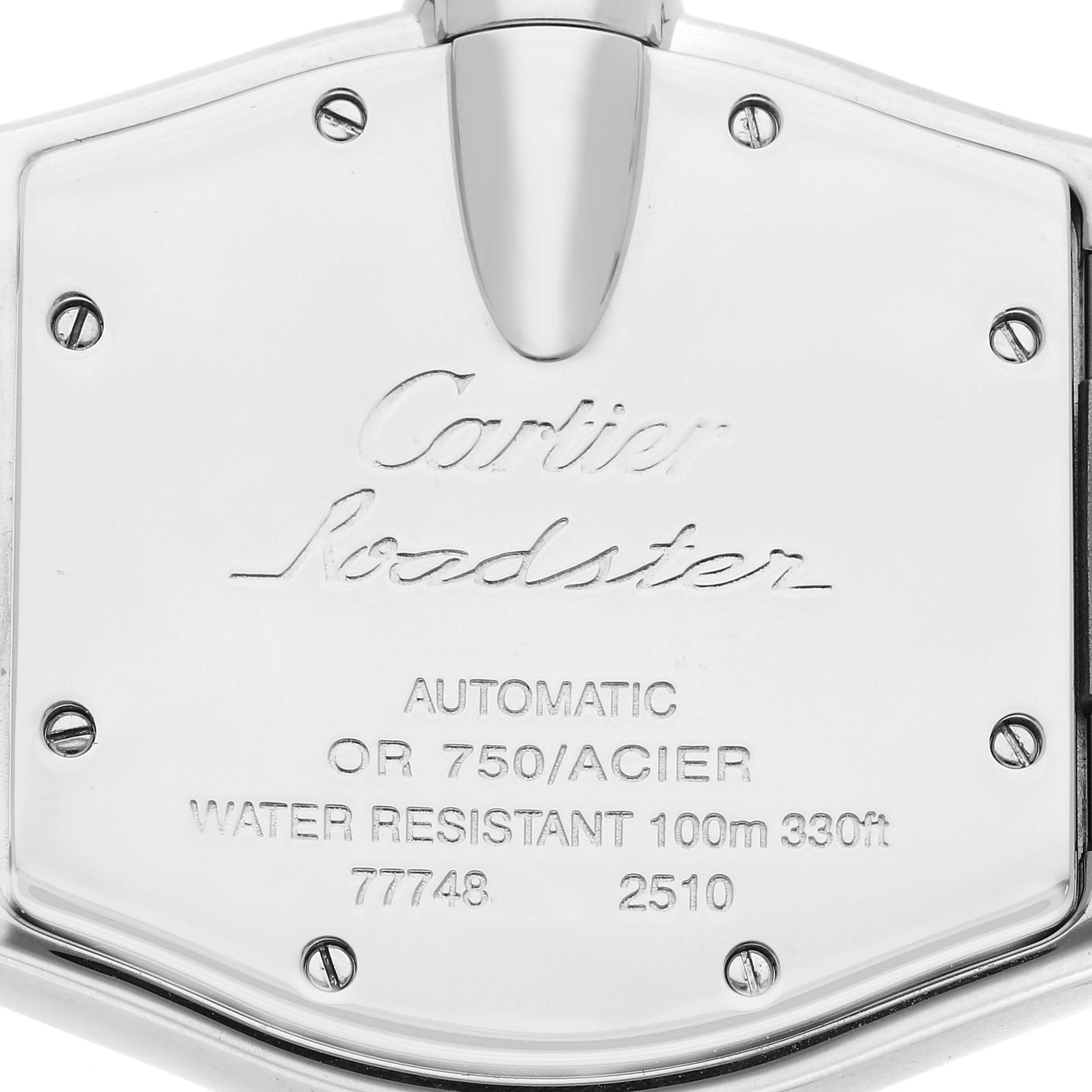 The image shows the back case of the Cartier Roadster W62031Y4 Men's Steel and Gold (two tone) Silver Dial W62031Y4 Men's Steel and Gold (two tone) Silver Dial watch, featuring engravings and screws.