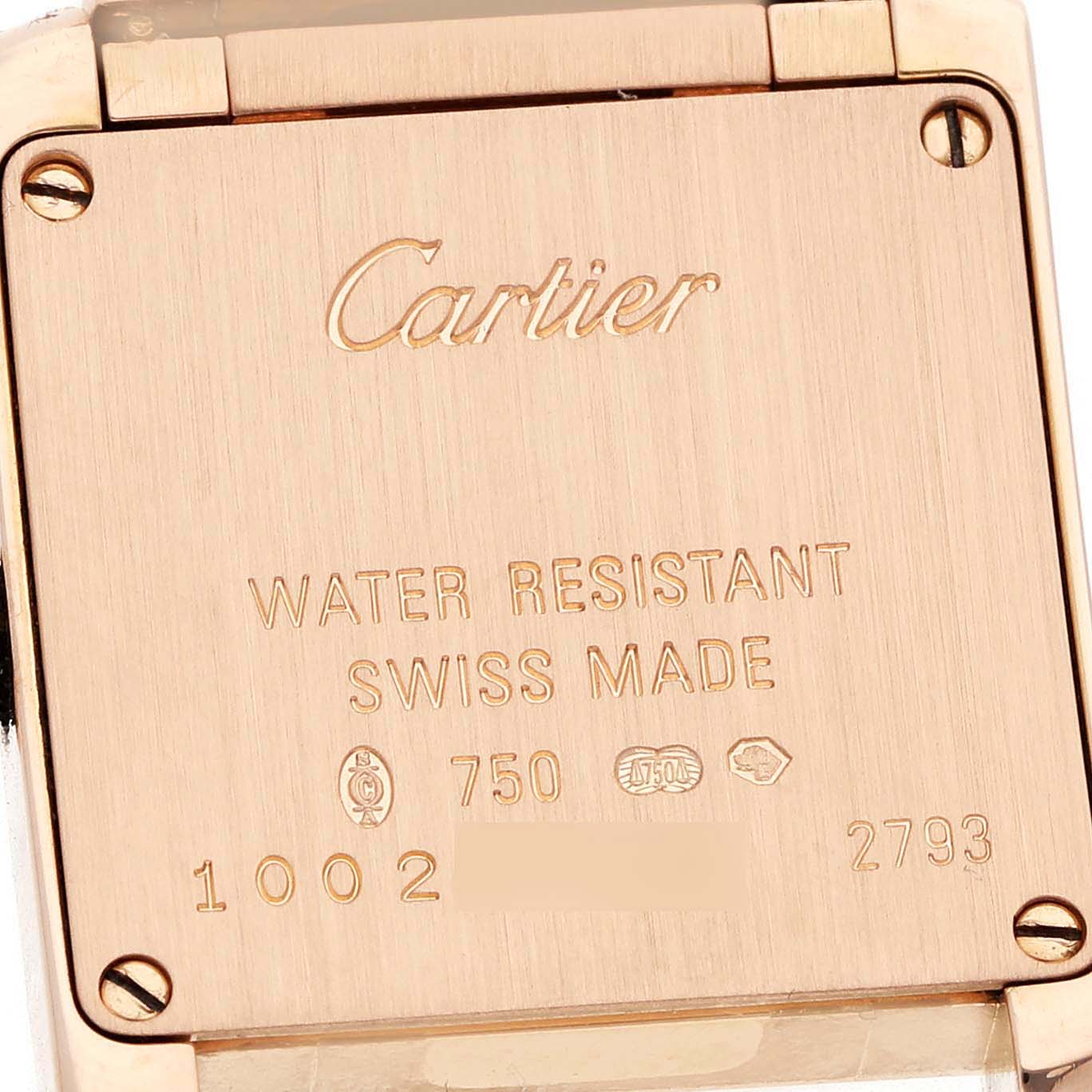 The image shows the back of a Cartier Tank Française watch, highlighting its engravings and screws.
