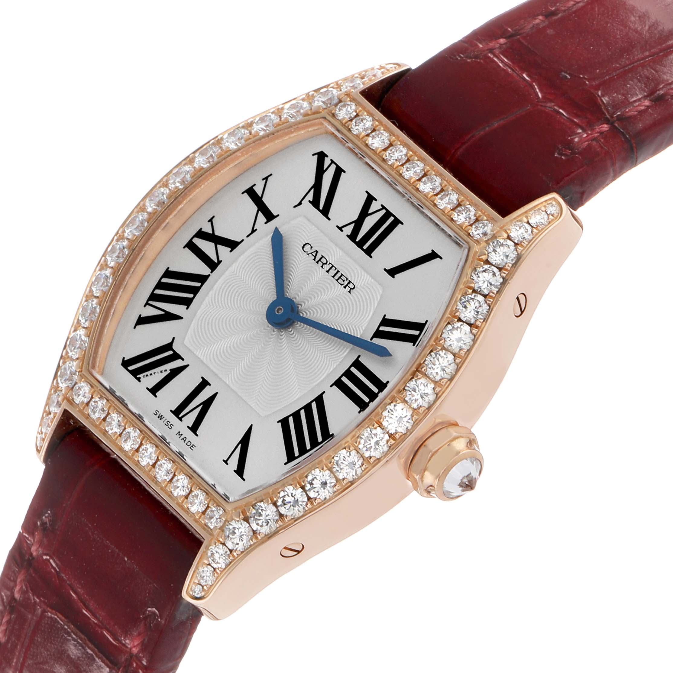 The Cartier Tortue WA501010 Women's Rose Gold Silver Dial watch is shown at an angled view, highlighting the case, diamond bezel, dial, and part of the strap.