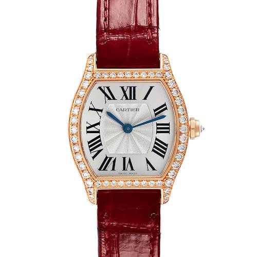 The Cartier Tortue WA501010 Women's Rose Gold Silver Dial watch is shown from a front view, displaying its diamond-set bezel, Roman numeral dial, and brown leather strap.