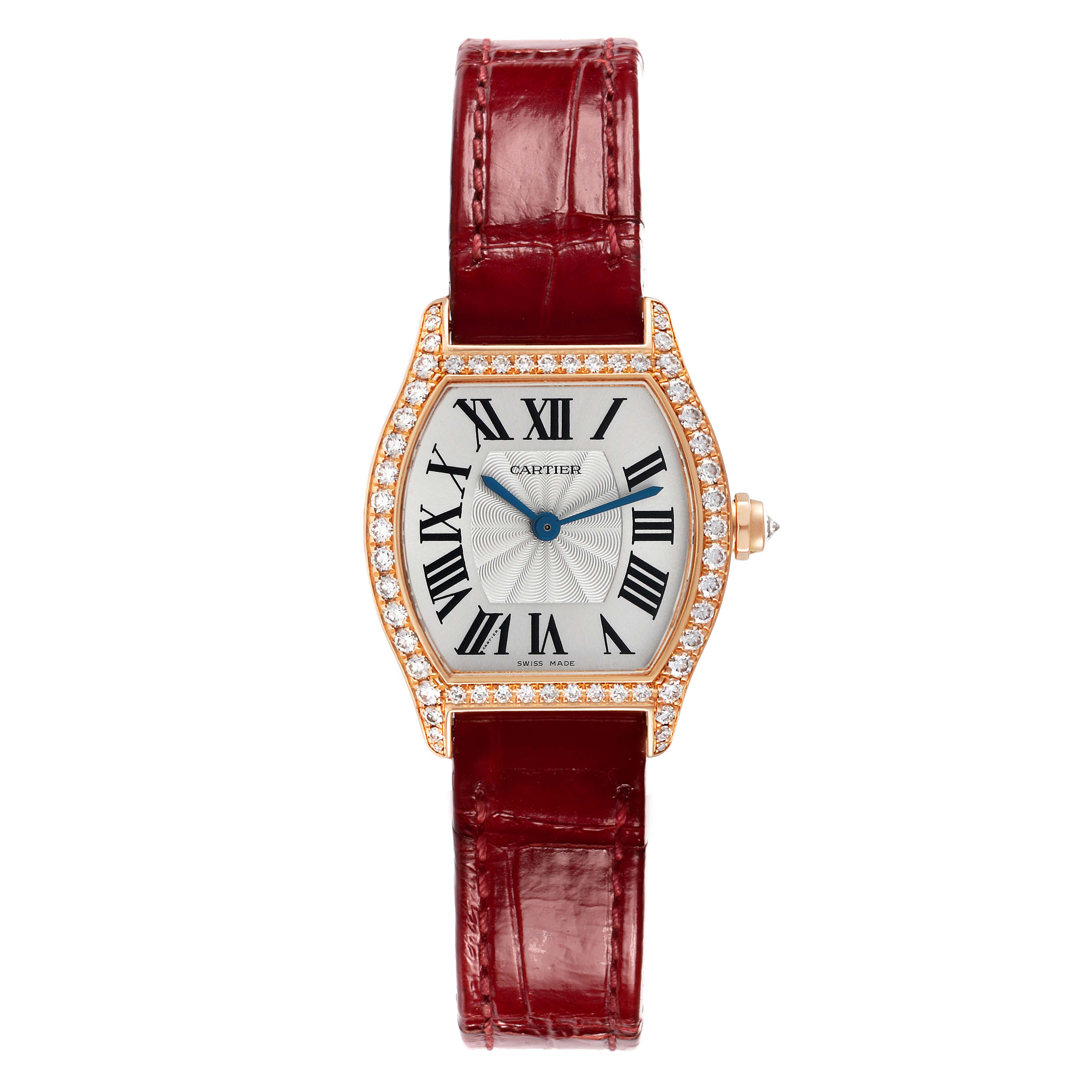 The Cartier Tortue WA501010 Women's Rose Gold Silver Dial watch is shown from the front, featuring a diamond-set bezel, Roman numerals, and a red leather strap.