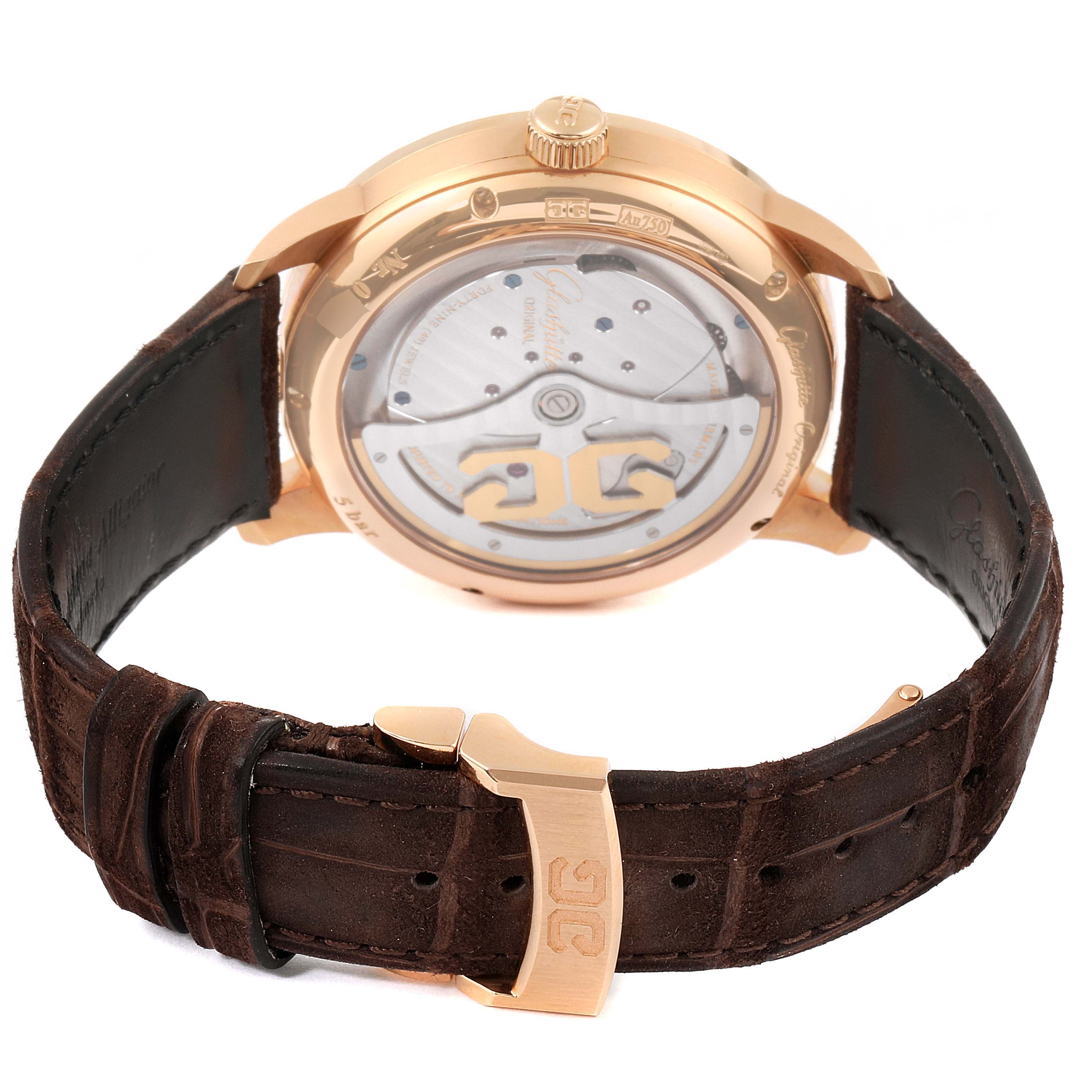 The image shows the back view of the Glashutte Original 1-91-02-01-05-30 Men's Rose Gold Grey Dial 1-91-02-01-05-30 Men's Rose Gold Grey Dial watch, highlighting its movement and brown leather strap with a gold buckle.