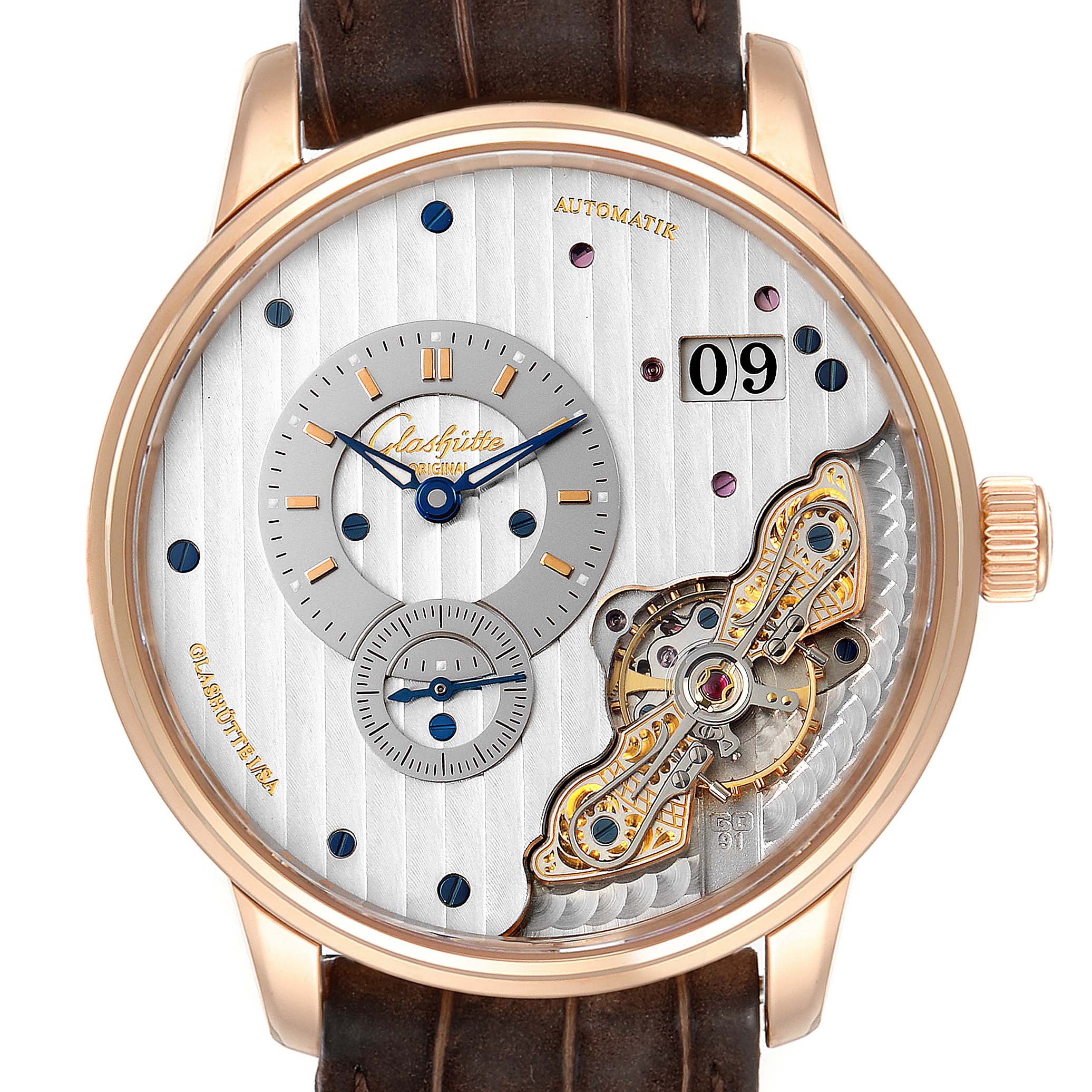 The Glashutte Original 1-91-02-01-05-30 Men's Rose Gold Grey Dial 1-91-02-01-05-30 Men's Rose Gold Grey Dial watch is shown from a front angle, highlighting its face, date window, and visible movement components.