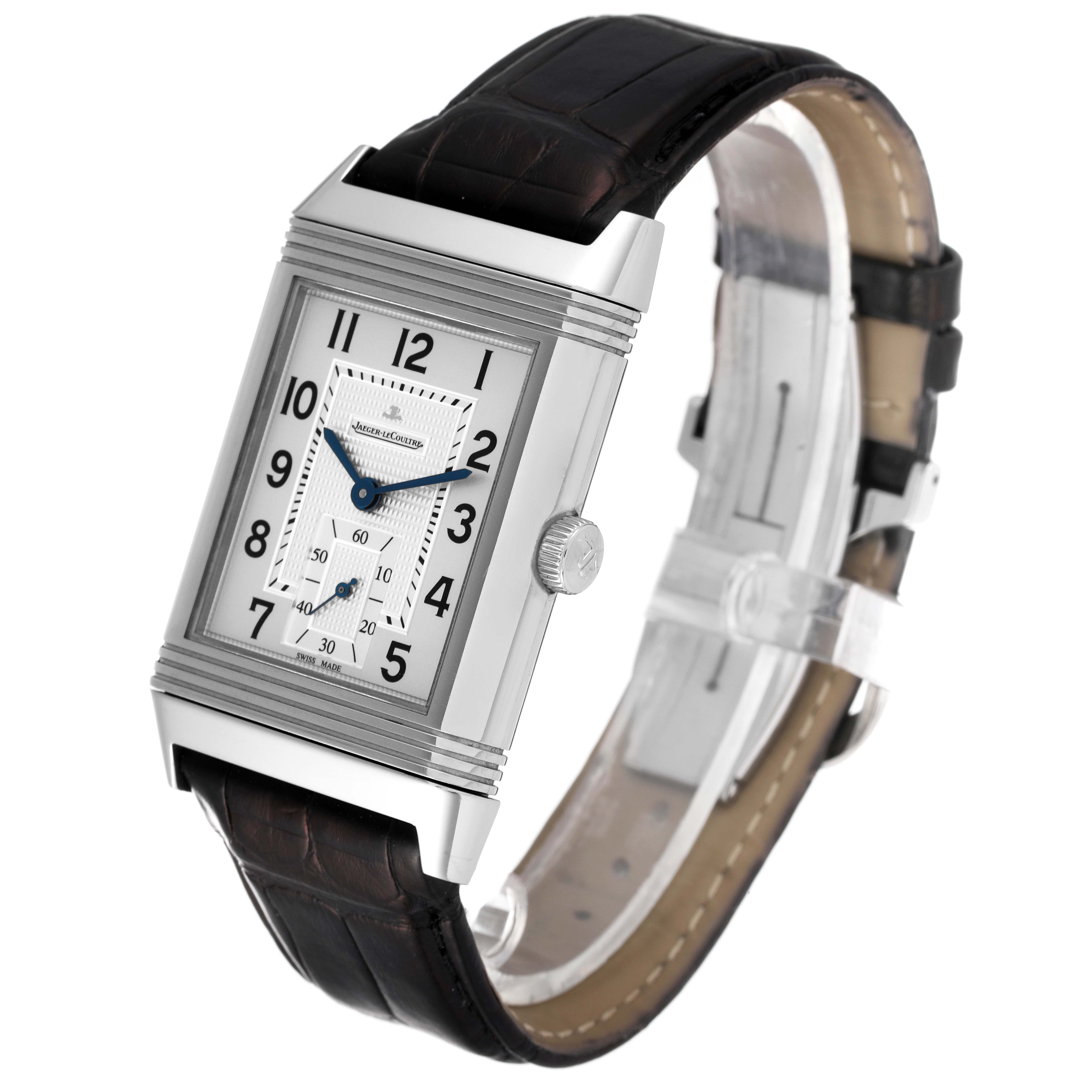 This image shows a Jaeger LeCoultre Reverso Q3738420 Men
s Stainless Steel Silver Dial Q3738420 Men
s Stainless Steel Silver Dial model watch at a three-quarter angle, displaying its face, case, and leather strap.