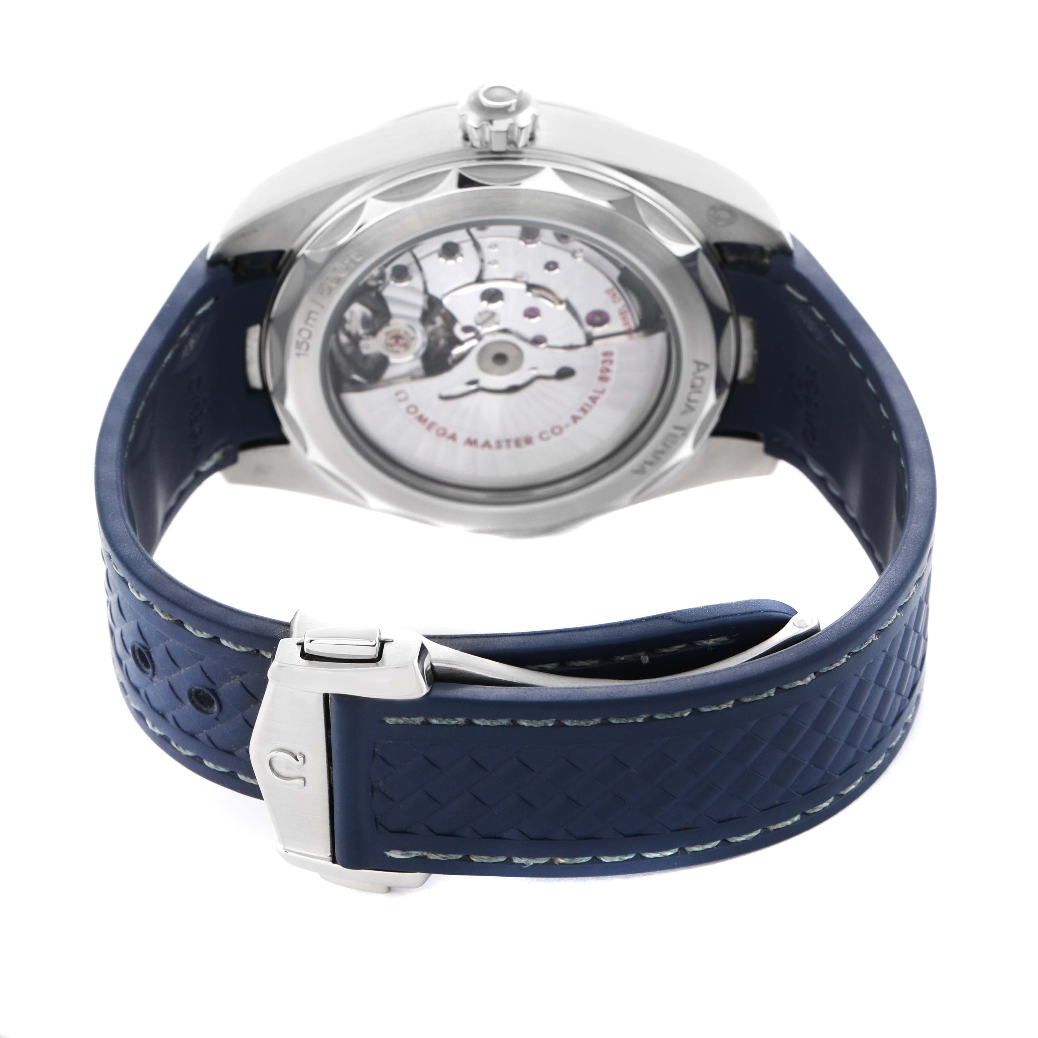 The image shows the back view of the Omega Aqua Terra 220.12.43.22.03.001 Men's Stainless Steel Blue Dial watch, highlighting its case back and blue strap.
