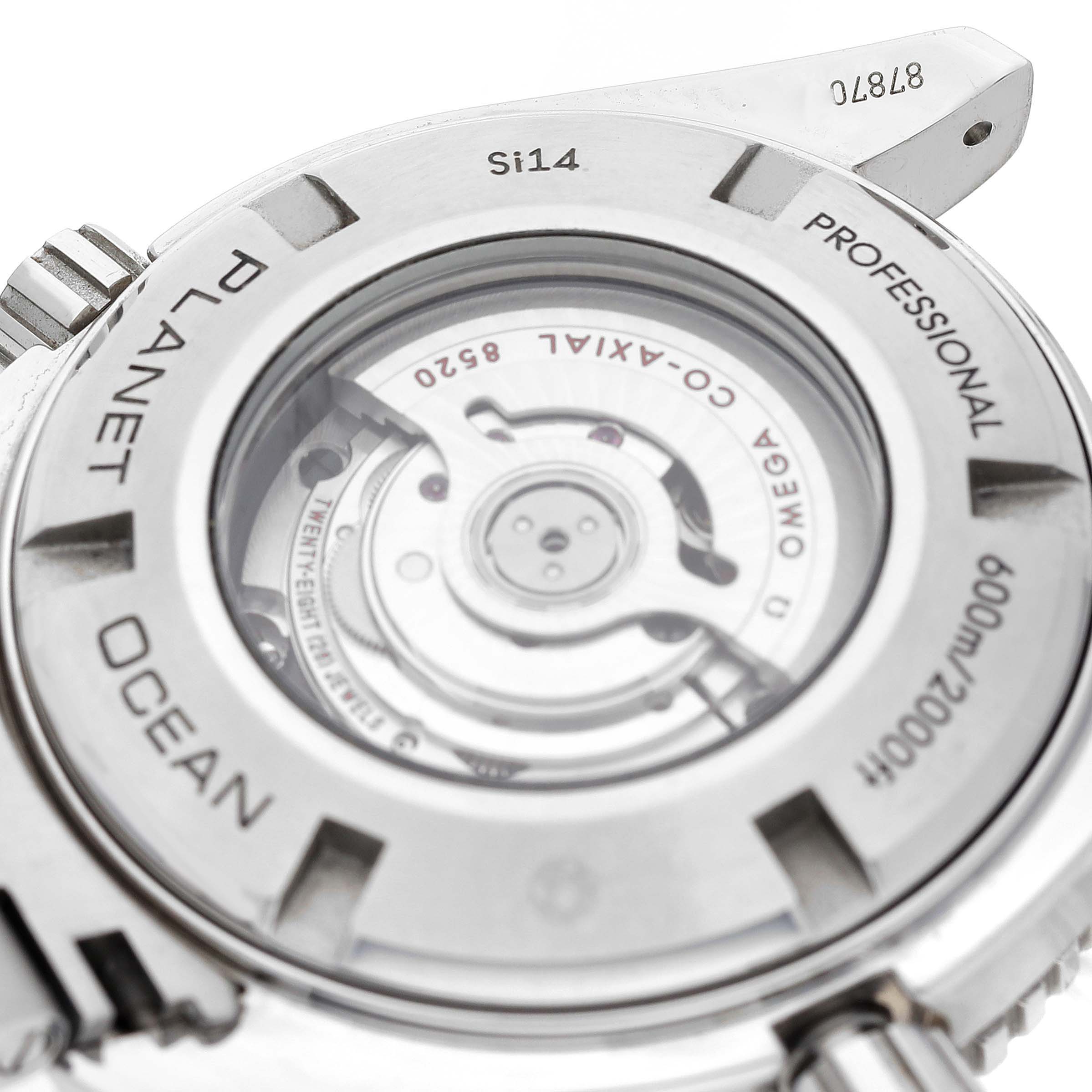 This image shows the back case of the Omega Planet Ocean 232.30.38.20.01.001 Men
s Stainless Steel Black Dial 232.30.38.20.01.001 Men
s Stainless Steel Black Dial watch, revealing its inner mechanics and inscriptions.