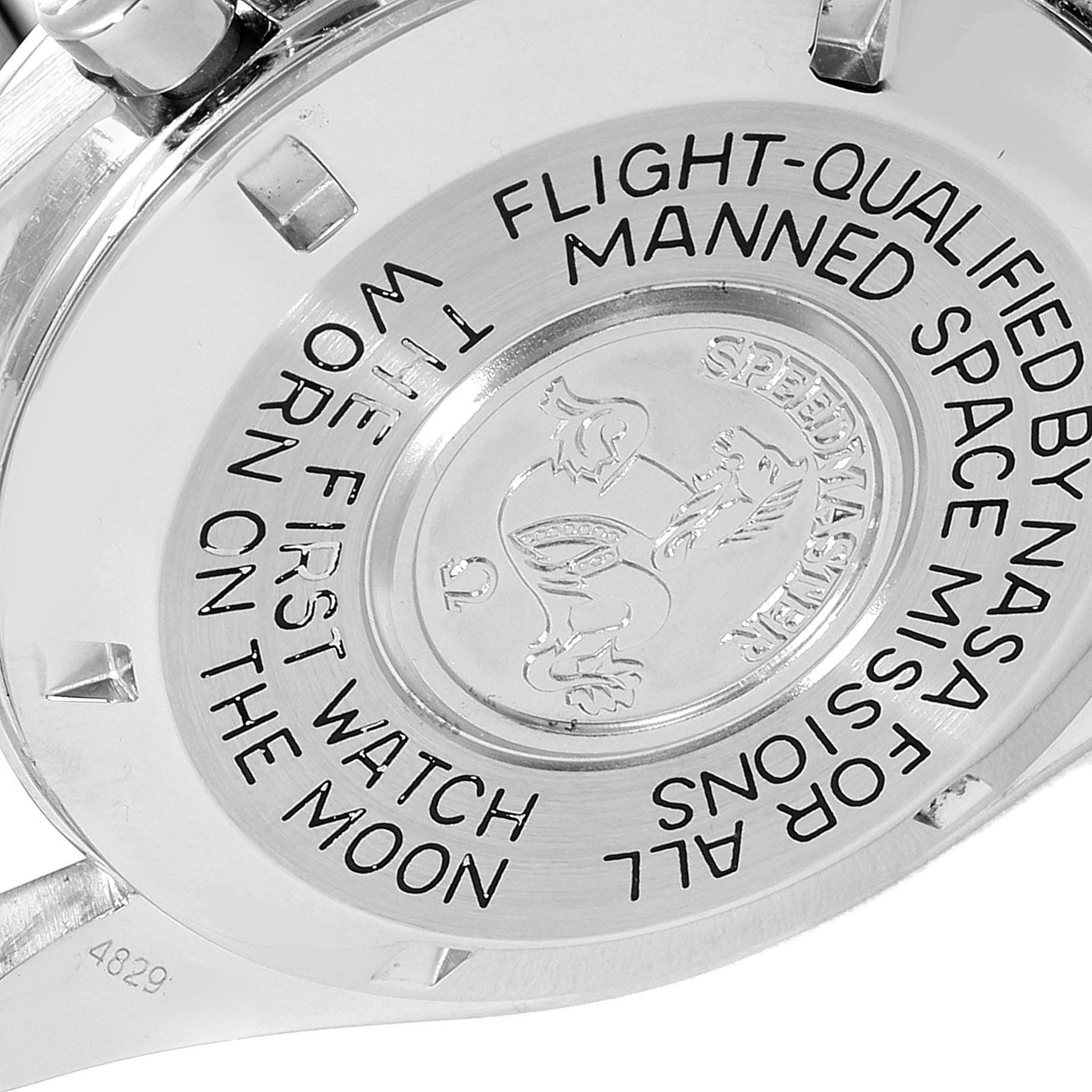 The image displays the back case of the Omega Speedmaster 3590.50.00 Men
s Stainless Steel Black Dial 3590.50.00 Men
s Stainless Steel Black Dial watch, highlighting its engraved details.