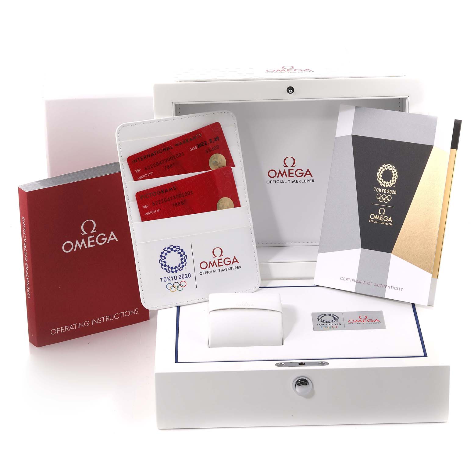 The image shows the packaging and accessories for the Omega Speedmaster 522.20.42.30.01.001 Men
s Steel and Gold (two tone) Black Dial 522.20.42.30.01.001 Men
s Steel and Gold (two tone) Black Dial watch, including manuals, warranty cards, and a box.