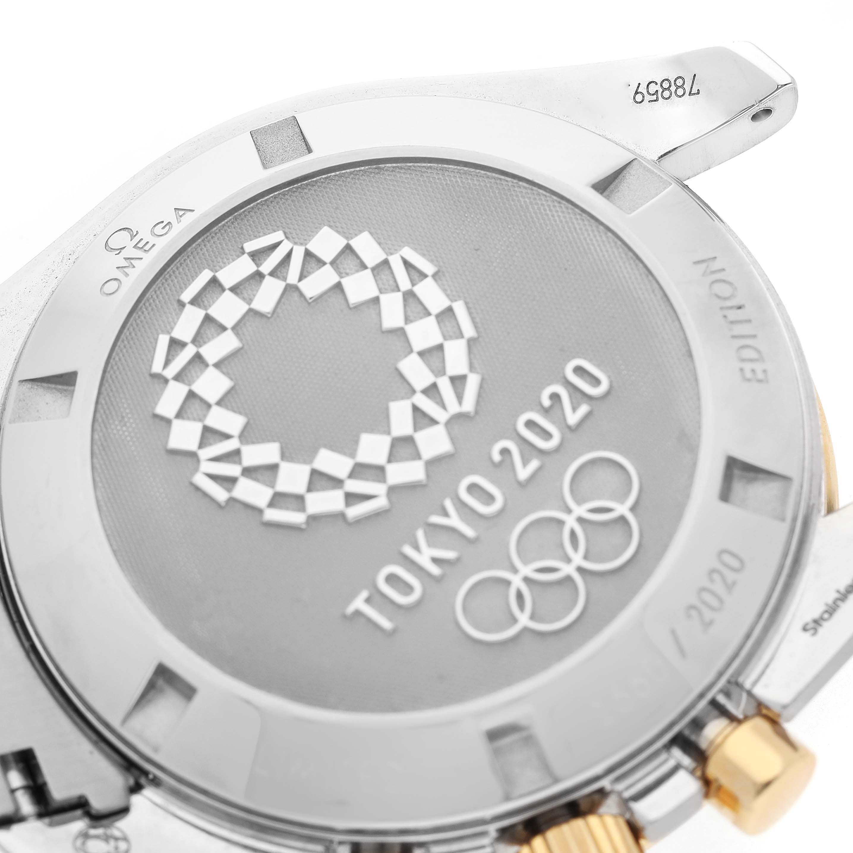 This image shows the case back of the Omega Speedmaster 522.20.42.30.01.001 Men
s Steel and Gold (two tone) Black Dial 522.20.42.30.01.001 Men
s Steel and Gold (two tone) Black Dial Tokyo 2020 Edition watch, featuring an engraved design and serial number.