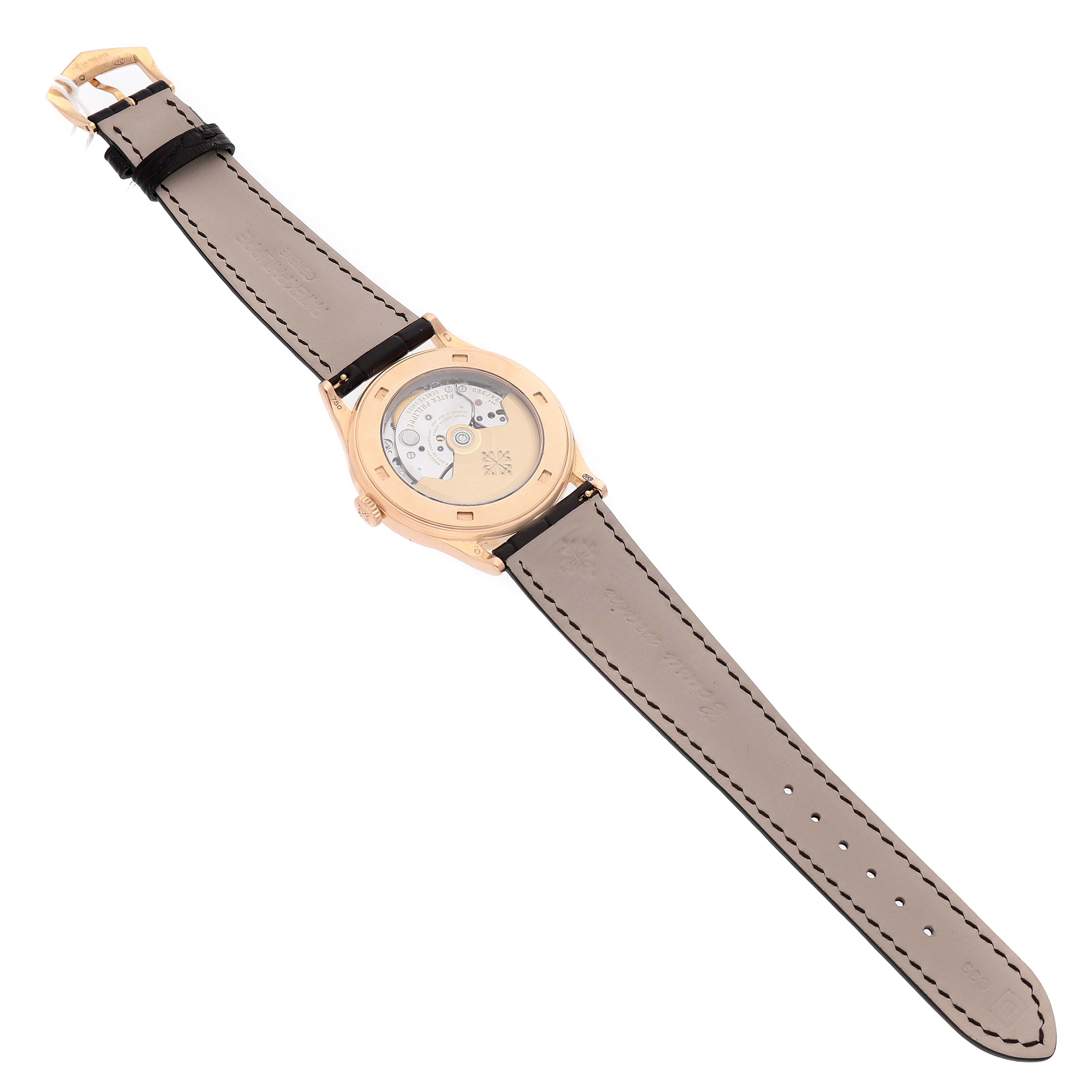 The image shows the back view of a Patek Philippe Calatrava 5296R-001 Men's Rose Gold Silver Dial watch, highlighting the movement and leather strap.