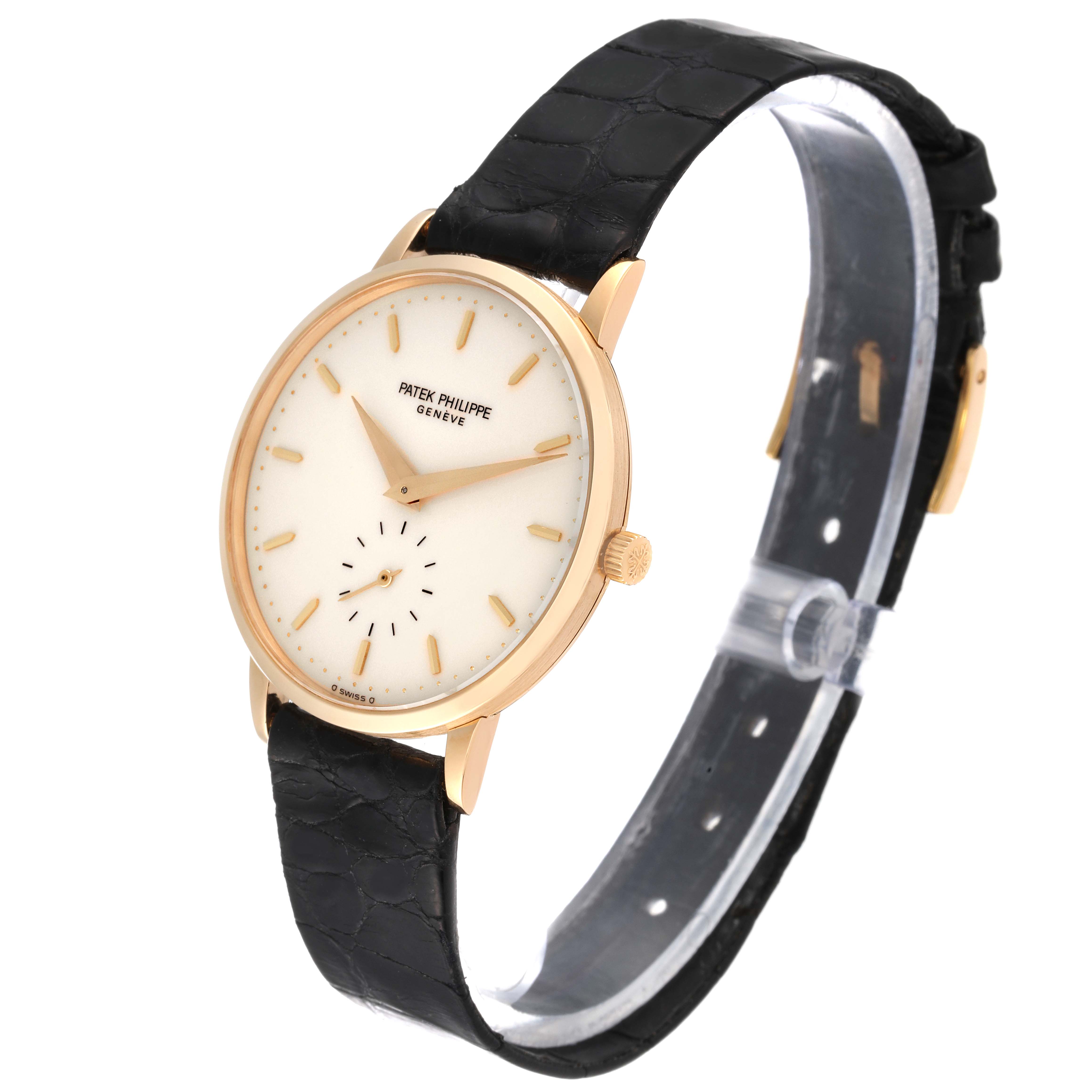 The image shows a side angle of the Patek Philippe Calatrava 3893J Men
s Yellow Gold White Dial 3893J Men
s Yellow Gold White Dial watch featuring its dial, hands, and black leather strap.