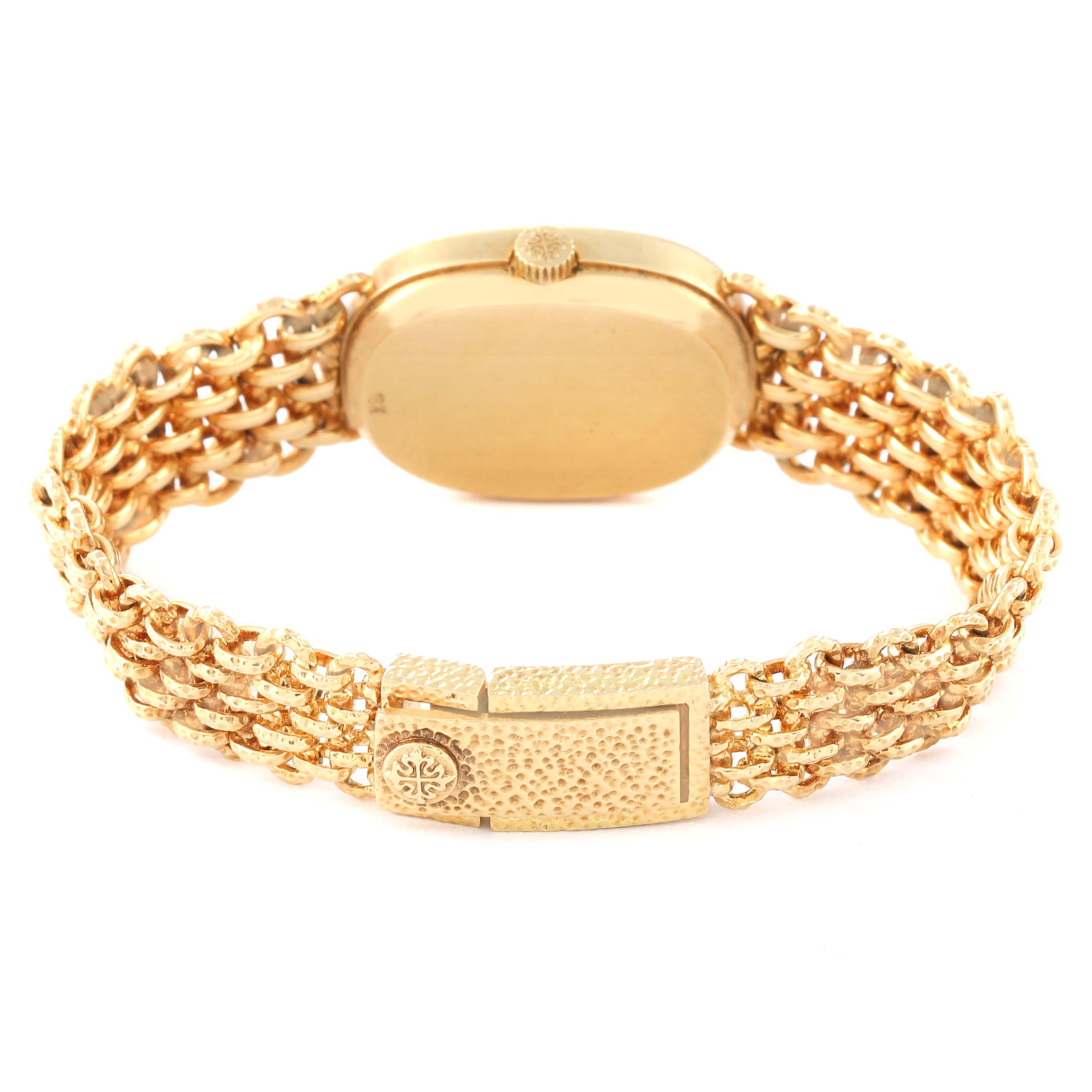 The image shows the back case and clasp of a Patek Philippe Golden Ellipse 4464/4 Women's Yellow Gold Blue Dial 4464/4 Women's Yellow Gold Blue Dial model watch at an angled rear view.