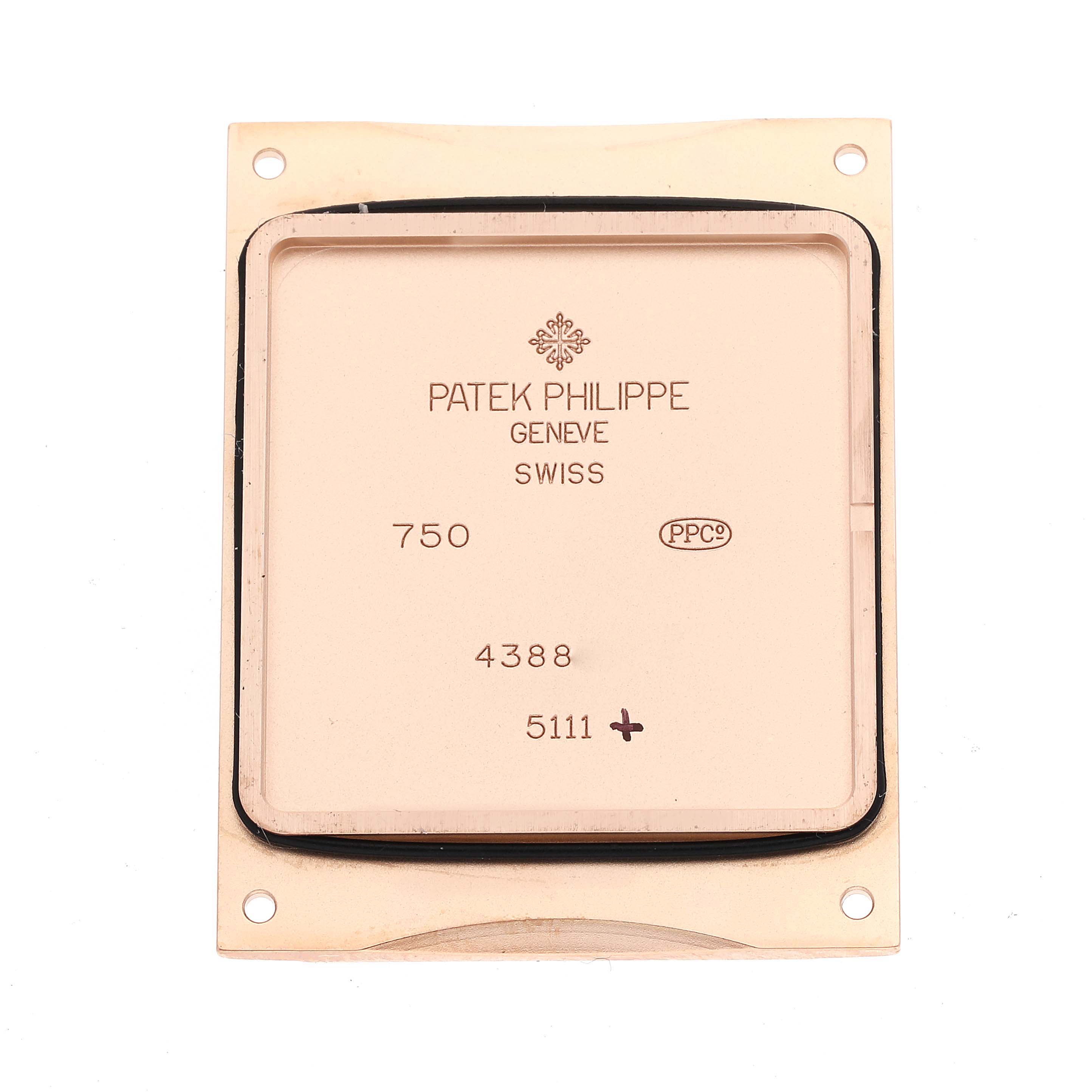 This image shows the back casing of a Patek Philippe Gondolo 5111R Men's Rose Gold Silver Dial 5111R Men's Rose Gold Silver Dial watch, with markings and identifying details visible.