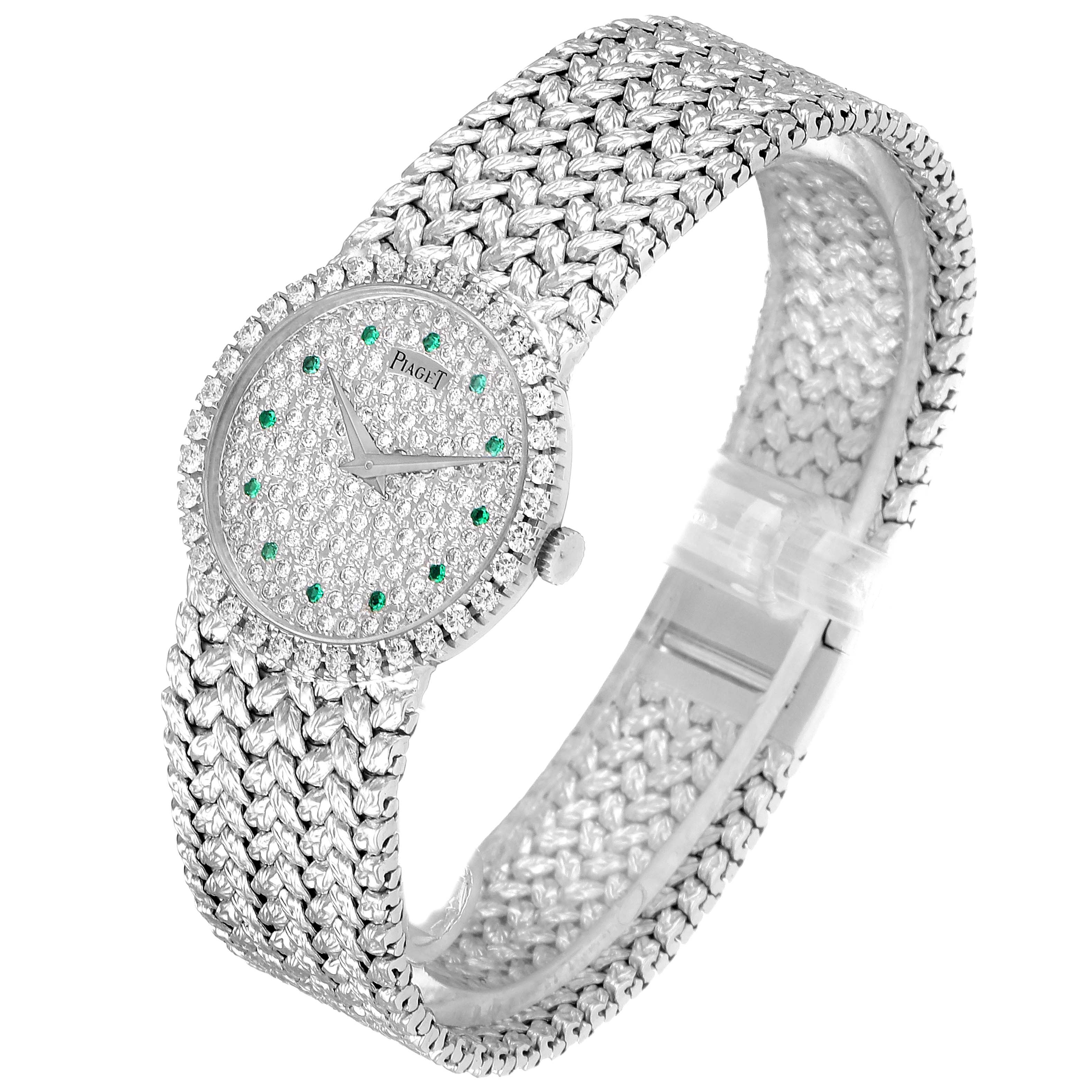 The White Gold Pave Diamond Emerald Dial Vintage Cocktail Ladies Watch 9706 by Piaget 9706 Women's White Gold  9706 Women's White Gold  is shown at an angle highlighting the face, bezel, and band.