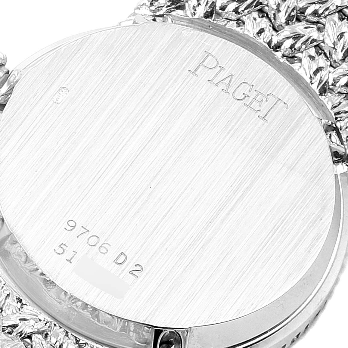 This image shows the back case of the Piaget 9706 Women's White Gold  9706 Women's White Gold  White Gold Pave Diamond Emerald Dial Vintage Cocktail Ladies Watch, model 9706.