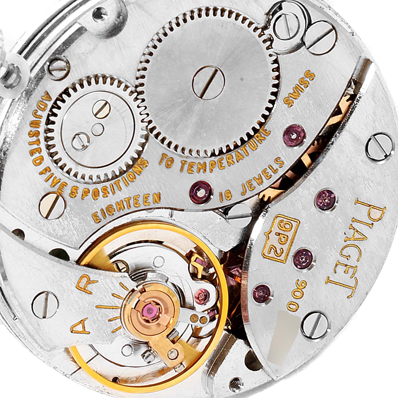 This close-up image focuses on the intricate mechanical movement of the Piaget 9706 Women's White Gold  9706 Women's White Gold  9706 model's watch mechanism.