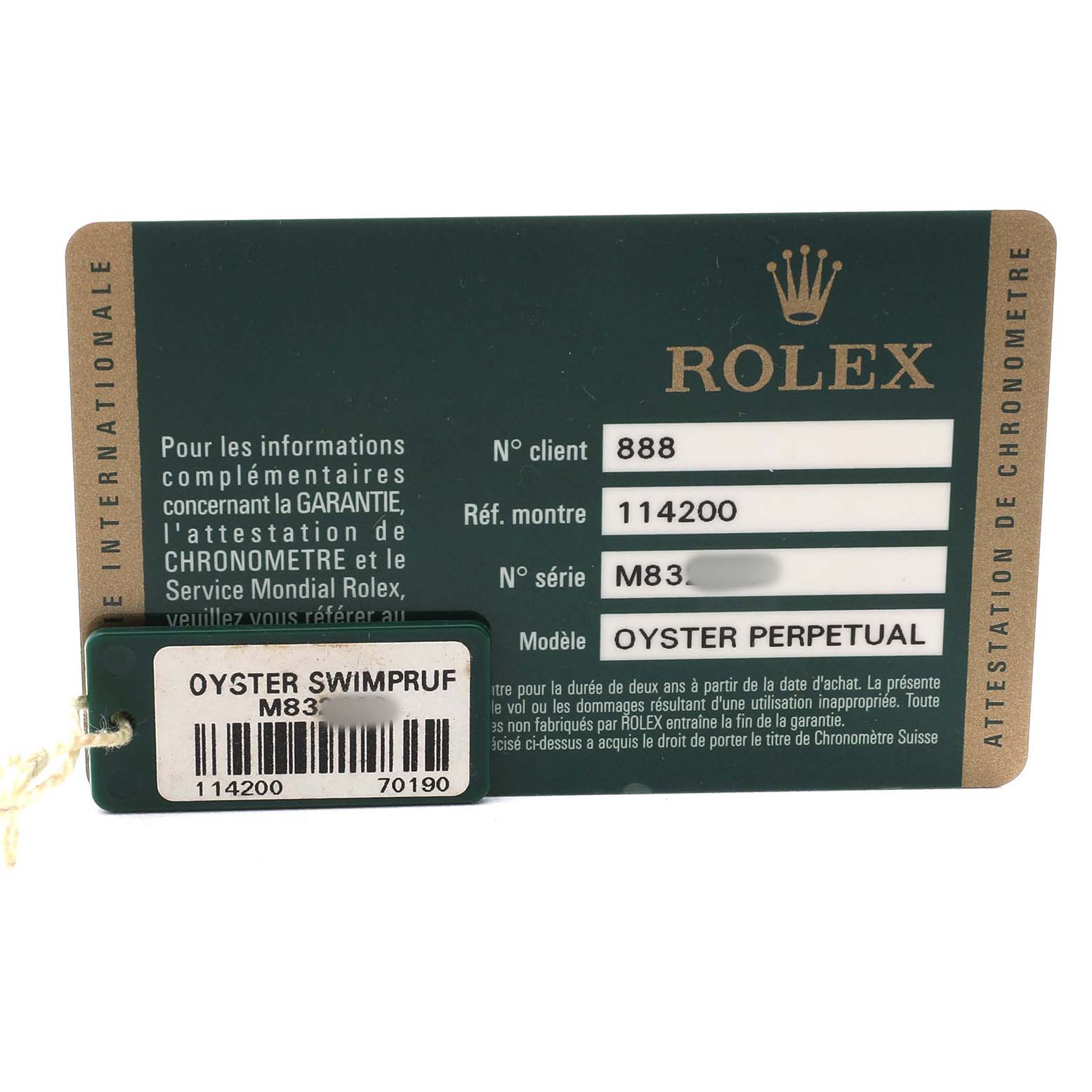 The image shows a warranty card and tag for a Rolex Air-King 114200 Men's Stainless Steel White Dial, featuring model and serial numbers.