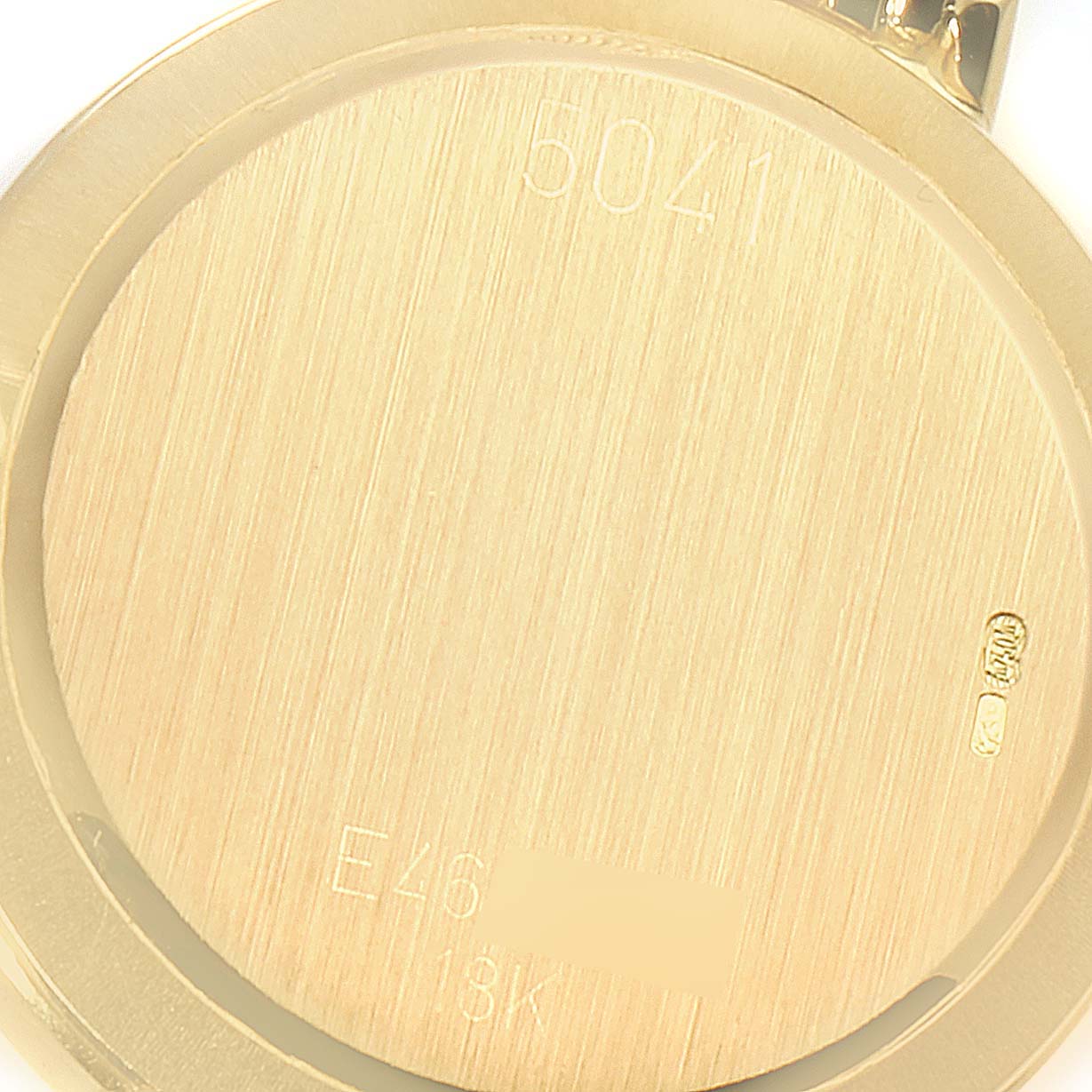 The image shows the back casing of a Rolex Cellini 5109 Men's Yellow Gold White Dial 5109 Men's Yellow Gold White Dial watch, highlighting its model number and 18K gold hallmark.