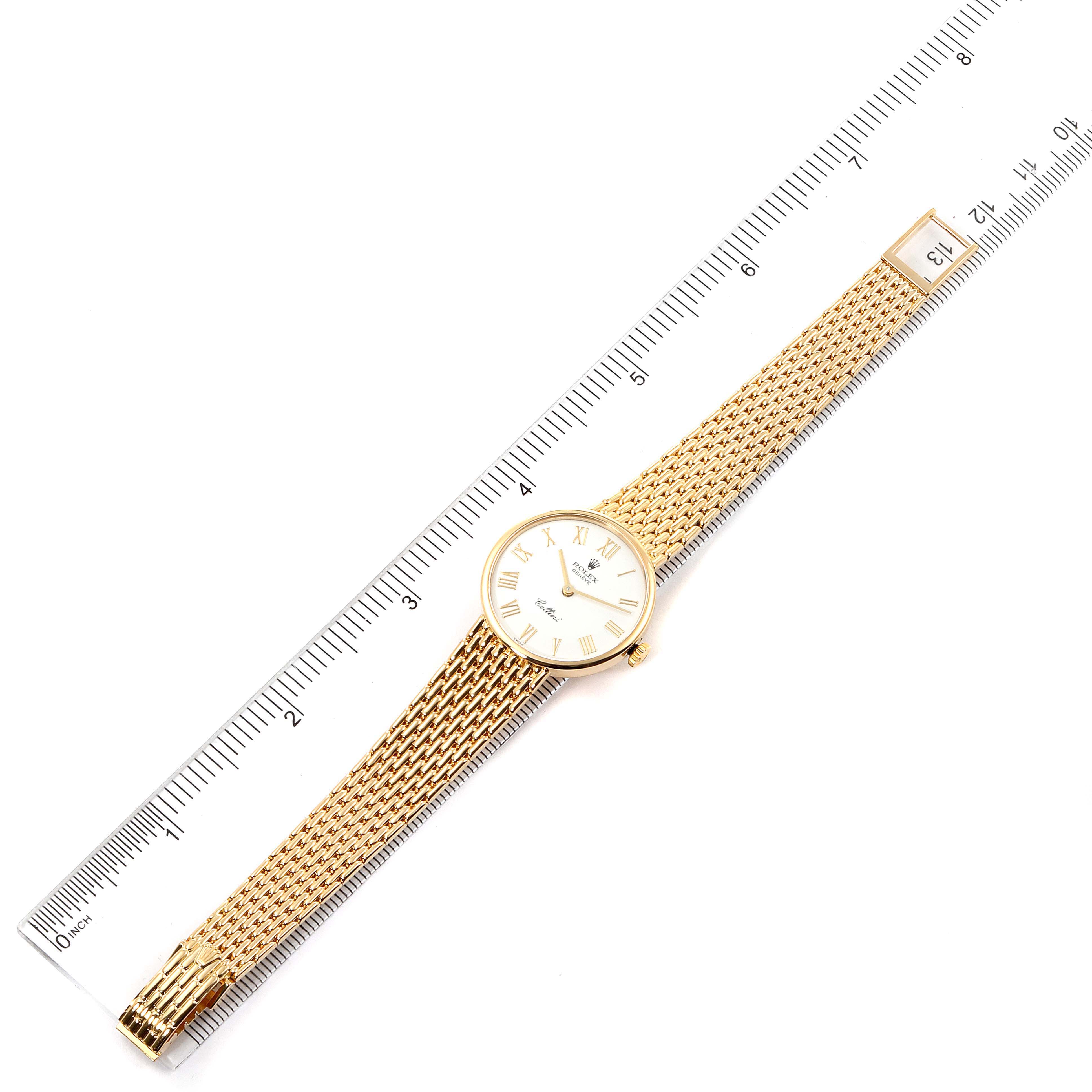 The Rolex Cellini 5109 Men's Yellow Gold White Dial 5109 Men's Yellow Gold White Dial watch is shown from a top-down angle, displaying the full face, bracelet, and part of a ruler for scale.