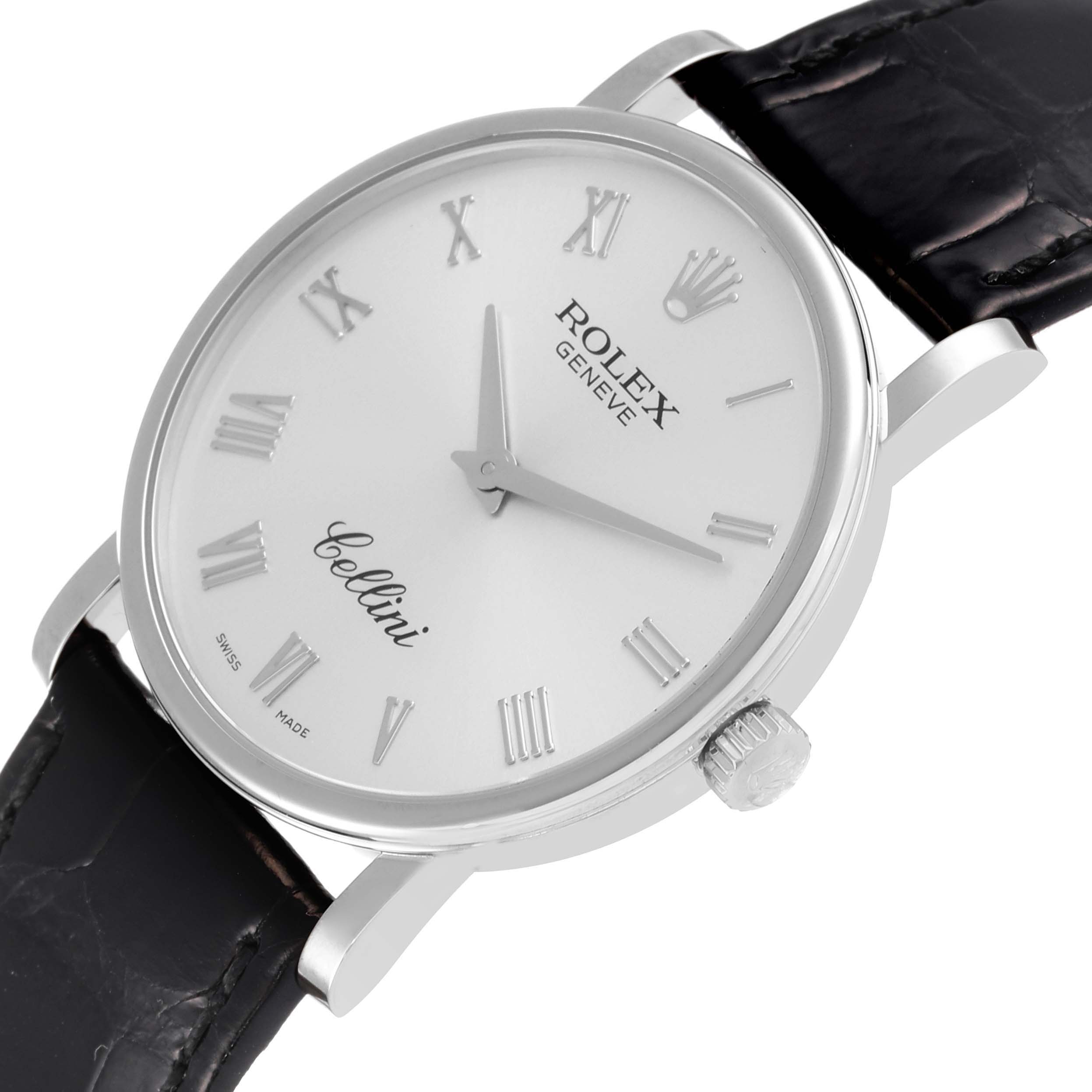 The image shows a side angle of a Rolex Cellini 5115/9 Men
s White Gold Silver Dial 5115/9 Men
s White Gold Silver Dial watch, highlighting the dial, crown, and part of the leather strap.