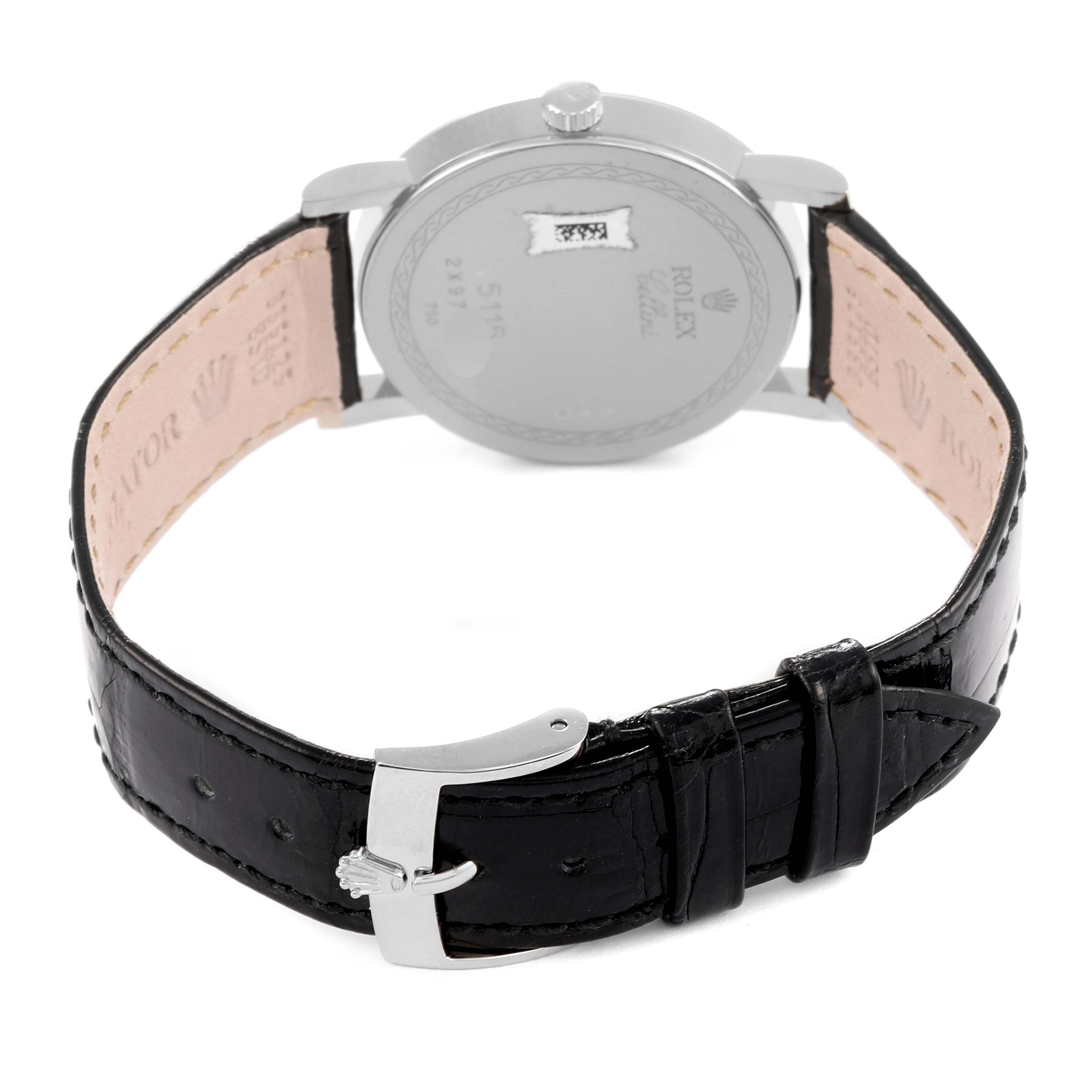 The Rolex Cellini 5115/9 Men
s White Gold Silver Dial 5115/9 Men
s White Gold Silver Dial watch is shown from the rear, displaying its back case and black leather strap with a silver buckle.