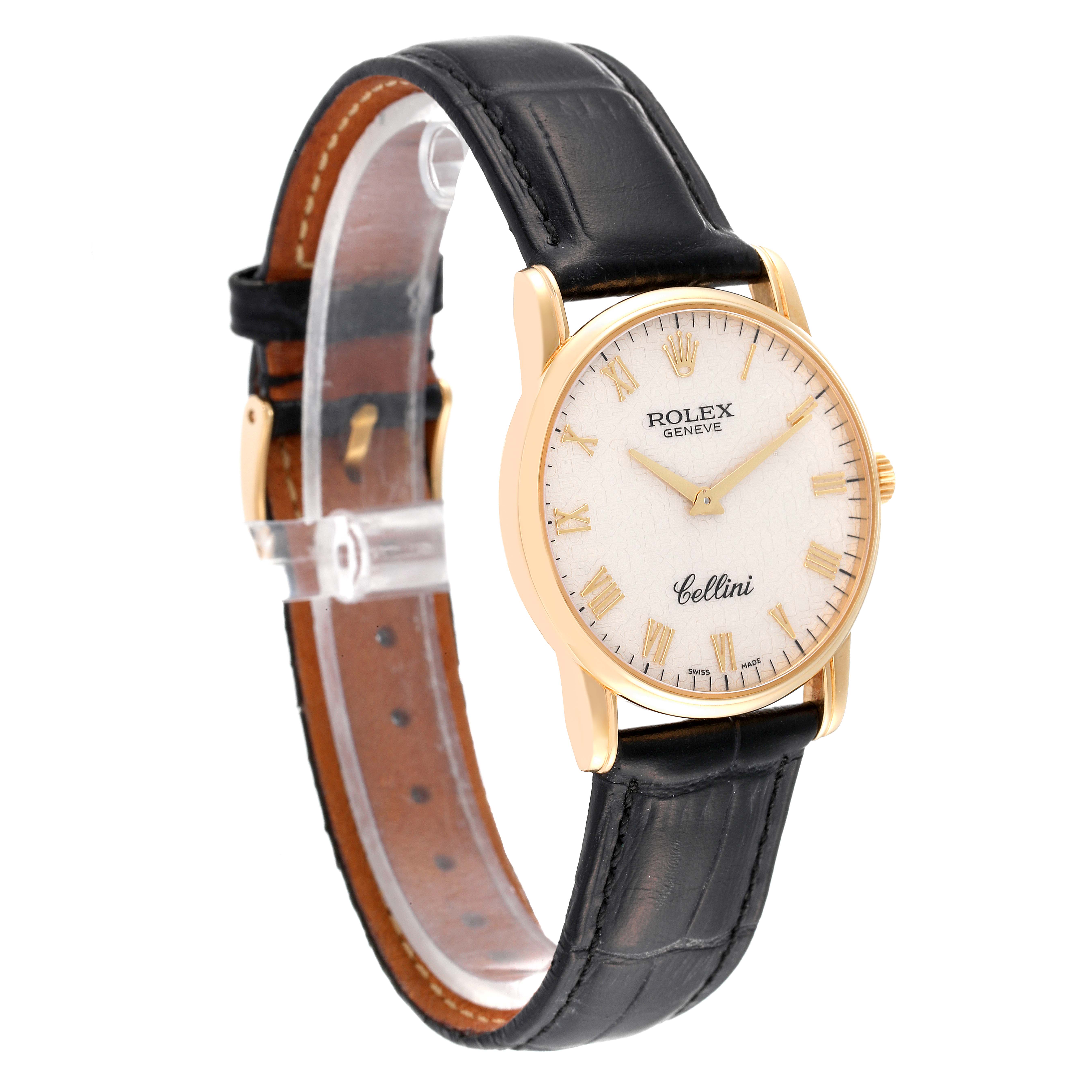 The Rolex Cellini 5116/8 Men's Yellow Gold Beige Dial 5116/8 Men's Yellow Gold Beige Dial watch is shown from a three-quarter angle, highlighting its gold case, white dial, and black leather strap.