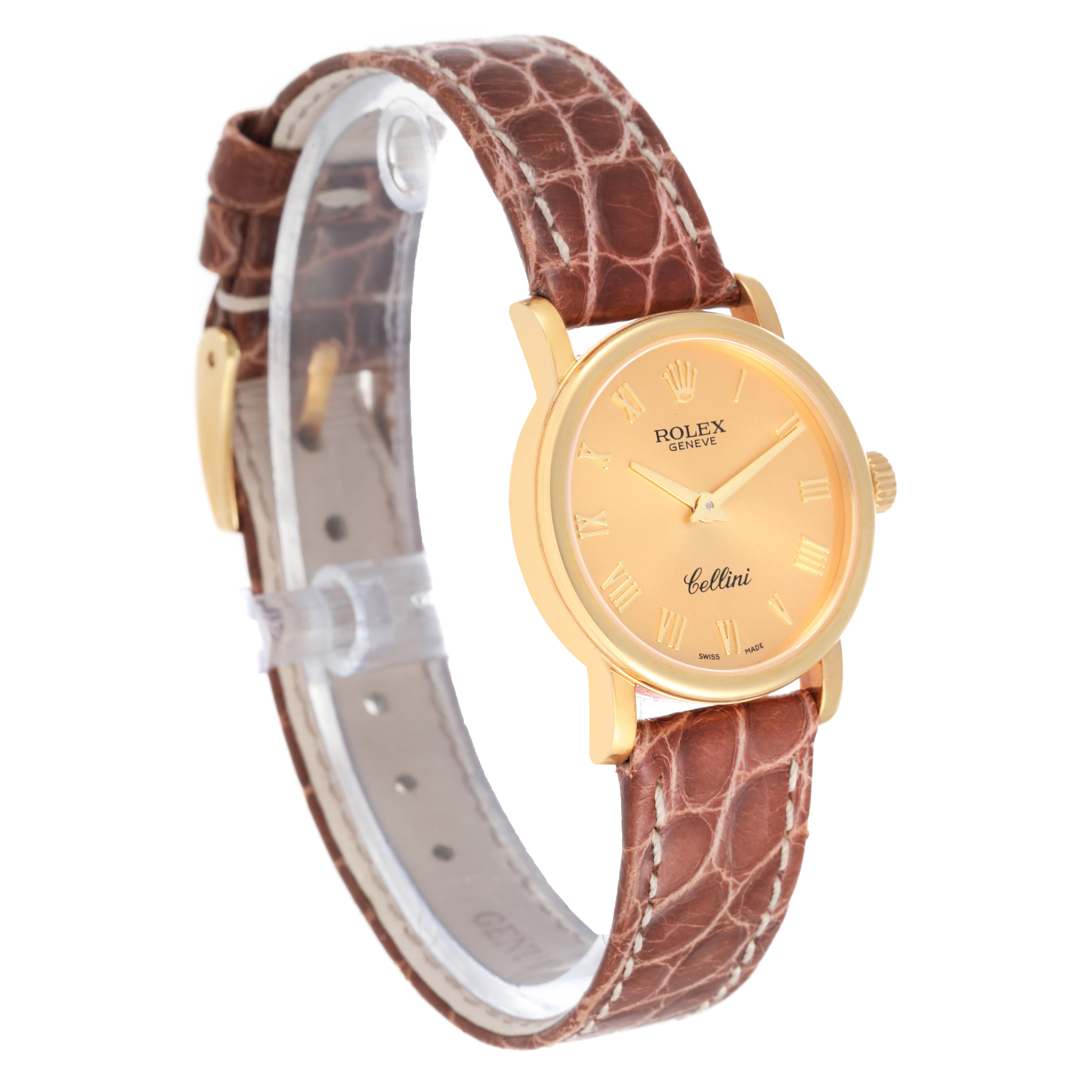 The image shows a Rolex Cellini 6110/8 Women's Yellow Gold Champagne Dial 6110/8 Women's Yellow Gold Champagne Dial watch at a slight angle, highlighting the face, bezel, crown, and brown leather strap.