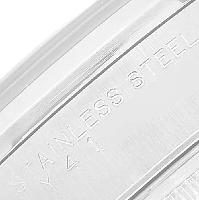 This image shows the inner case back of a Rolex Date 15200 Men
s Stainless Steel Black Dial 15200 Men
s Stainless Steel Black Dial model watch engraved with "STAINLESS STEEL."