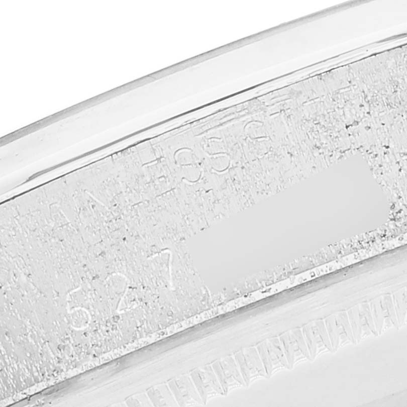 This image shows a close-up of the engraved serial number on the case back of a Rolex Vintage Collection 1500 Men
s Stainless Steel Silver Dial 1500 Men
s Stainless Steel Silver Dial model.