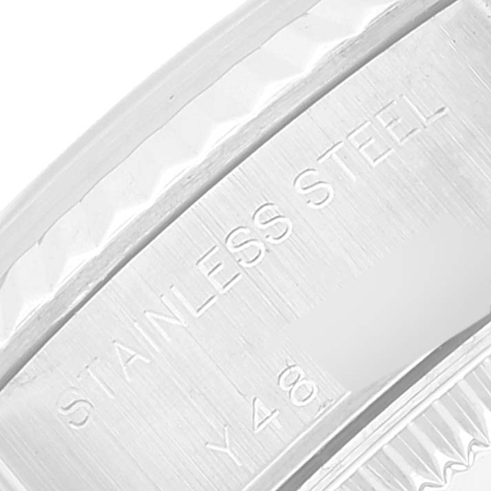 The image shows a close-up of the stainless steel caseback and rim of a Rolex Datejust 79174 Women's Stainless Steel Black Dial 79174 Women's Stainless Steel Black Dial watch.