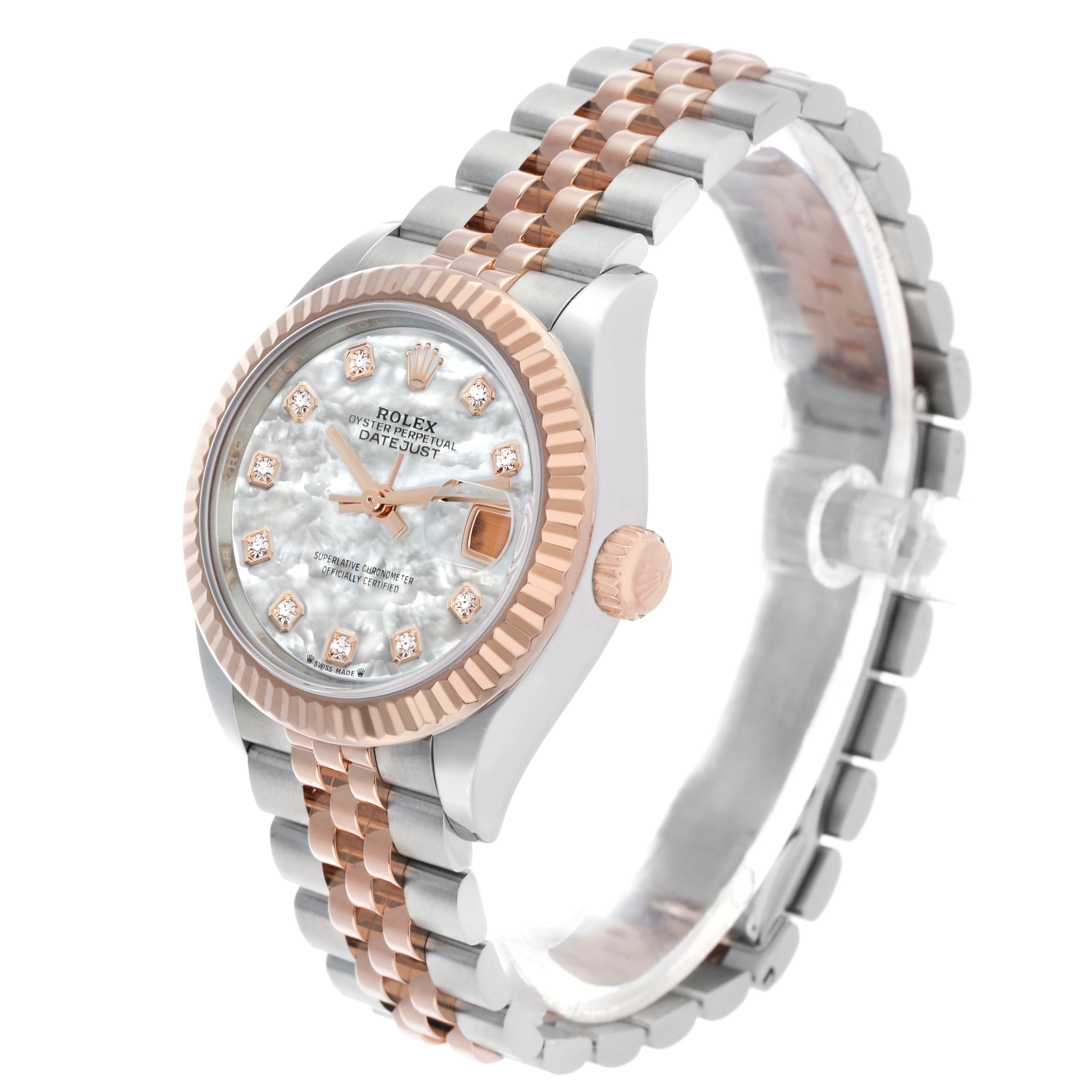 The Rolex Datejust 279171 Women's Steel and Gold (two tone) Mother of Pearl Dial watch is shown at a three-quarter angle, highlighting the fluted bezel, bracelet, and dial with diamond markers.