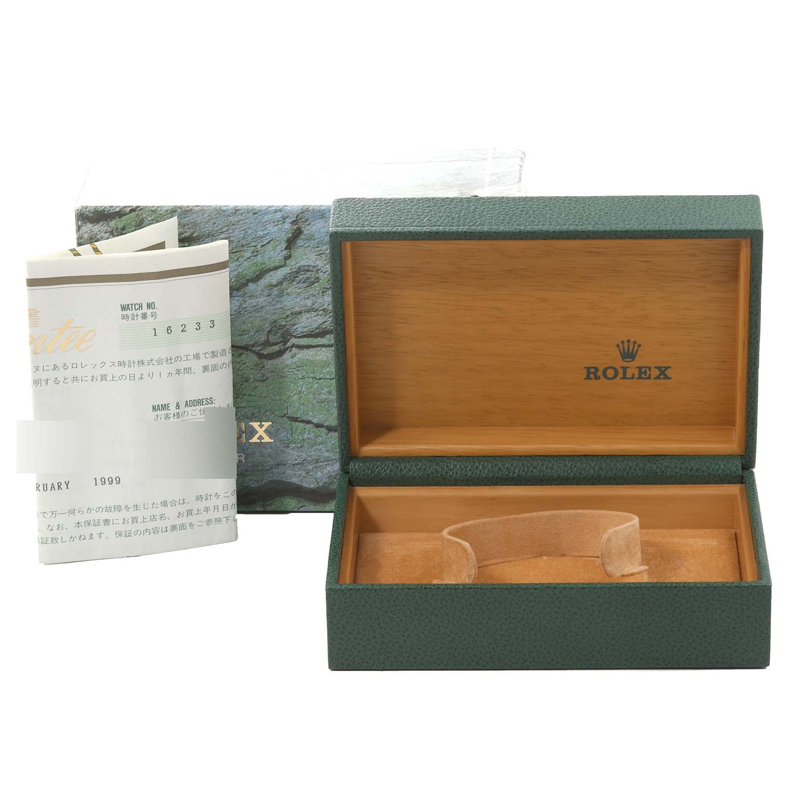 This image shows an open Rolex Datejust 16233 Men's Steel and Gold (two tone) Black Dial 16233 Men's Steel and Gold (two tone) Black Dial watch box with a booklet, viewed from the front.