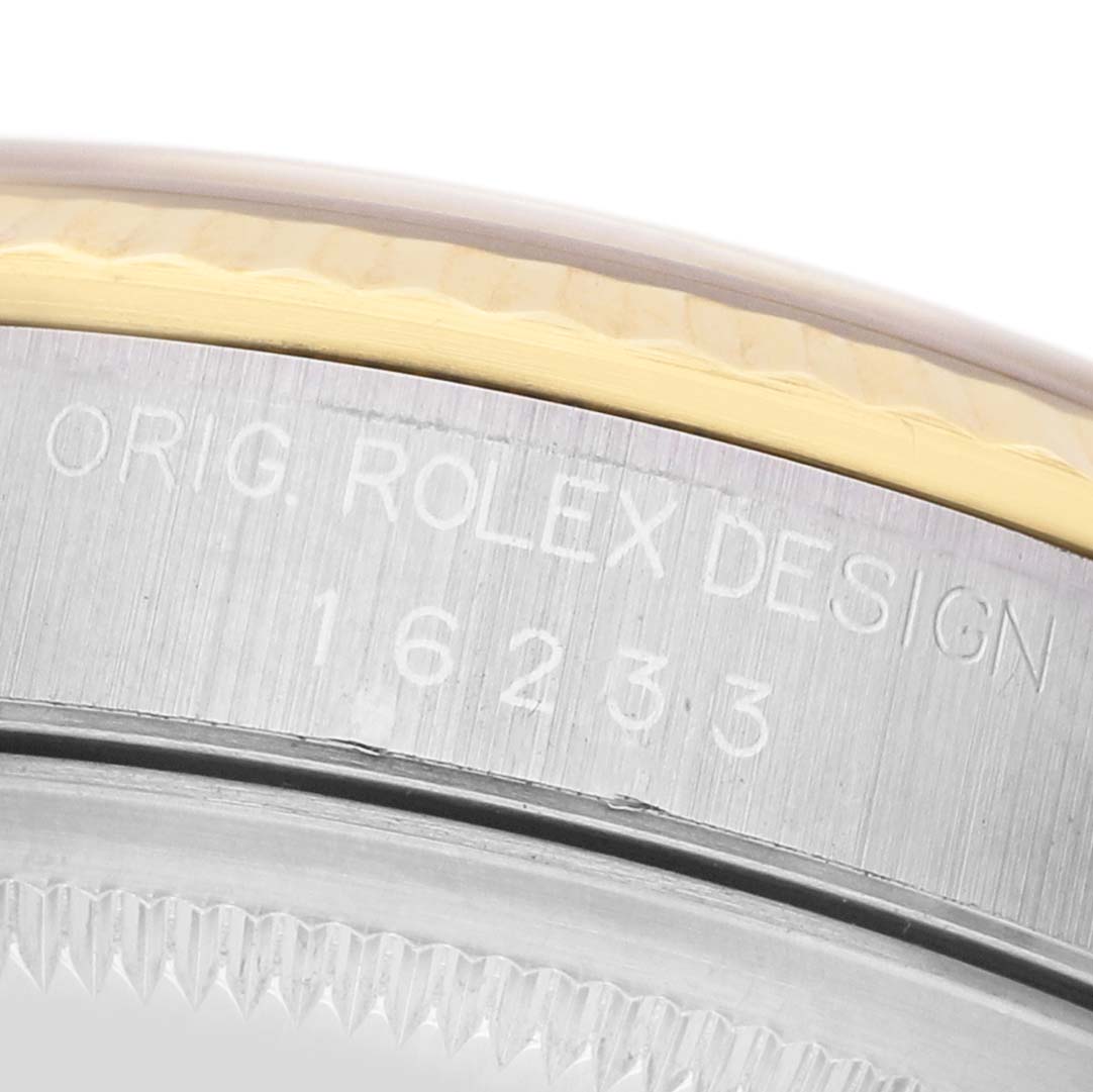 The image shows a side view of the Rolex Datejust 16233 Men's Steel and Gold (two tone) Silver Dial detailing the engravings and bezel.