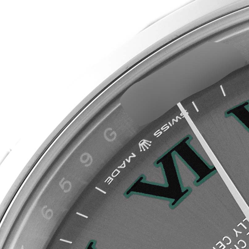 This image shows a close-up of the dial of a Rolex Datejust 41 126300 Men
s Stainless Steel Grey Dial 126300 Men
s Stainless Steel Grey Dial, focusing on the edge near the "Swiss Made" label.
