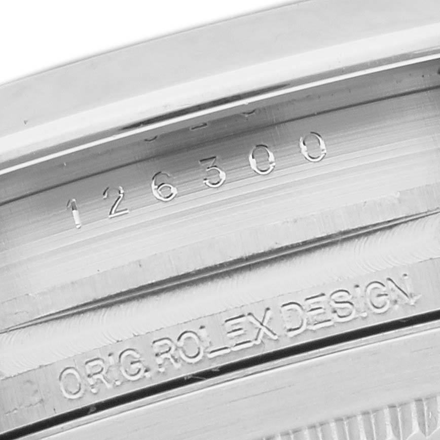 This image shows a close-up of the case detailing, with the model number and "ORIG. ROLEX DESIGN" engraving on the Rolex Datejust 41 126300 Men
s Stainless Steel Grey Dial 126300 Men
s Stainless Steel Grey Dial.