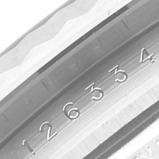 This image shows a close-up angle of the fluted bezel and the etched inner ring with numerals of a Rolex Datejust 41 126334 Men
s Stainless Steel Grey Dial 126334 Men
s Stainless Steel Grey Dial watch.