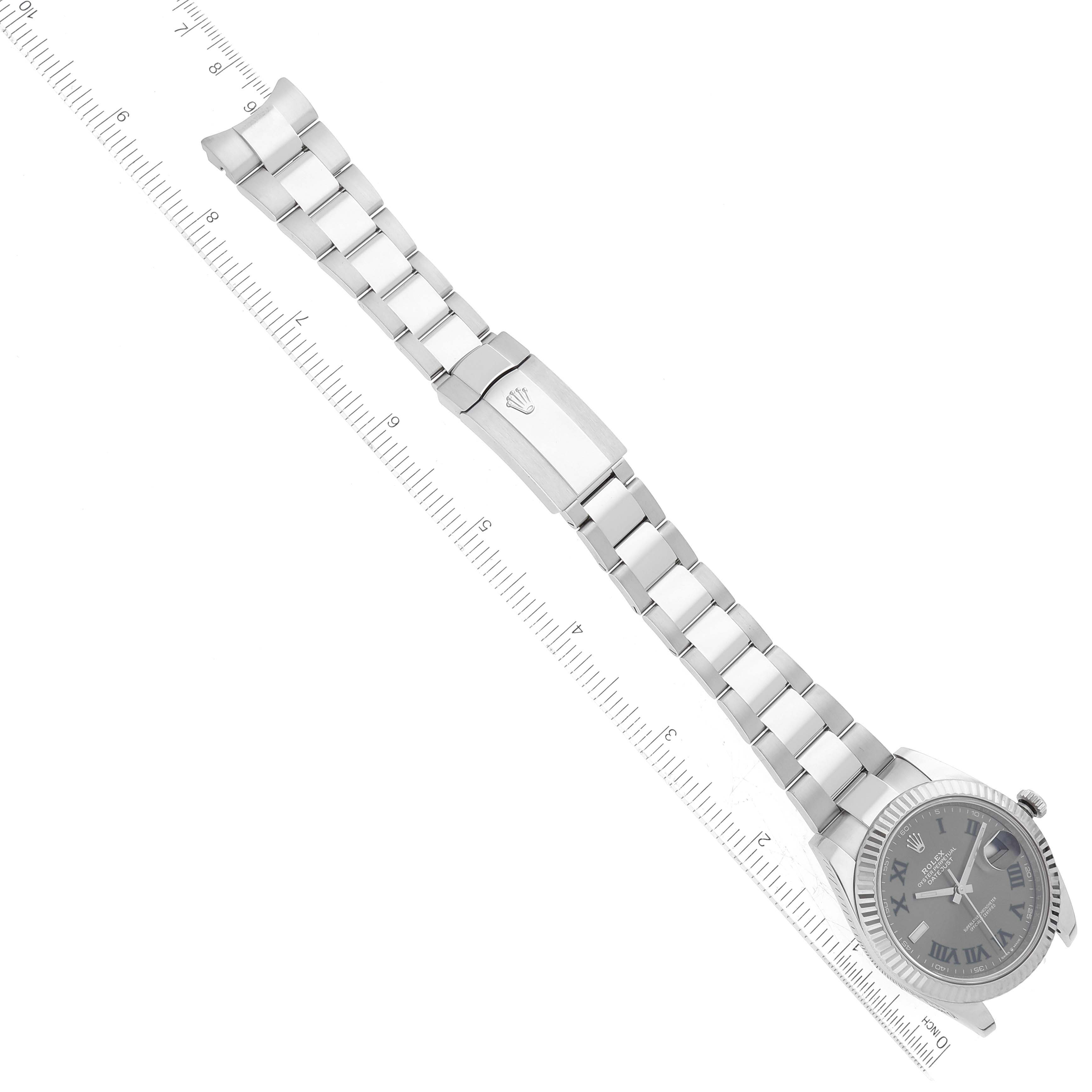 This image shows a top view of a Rolex Datejust 41 126334 Men
s Stainless Steel Grey Dial 126334 Men
s Stainless Steel Grey Dial watch, highlighting its dial, bezel, and bracelet with a ruler for scale.