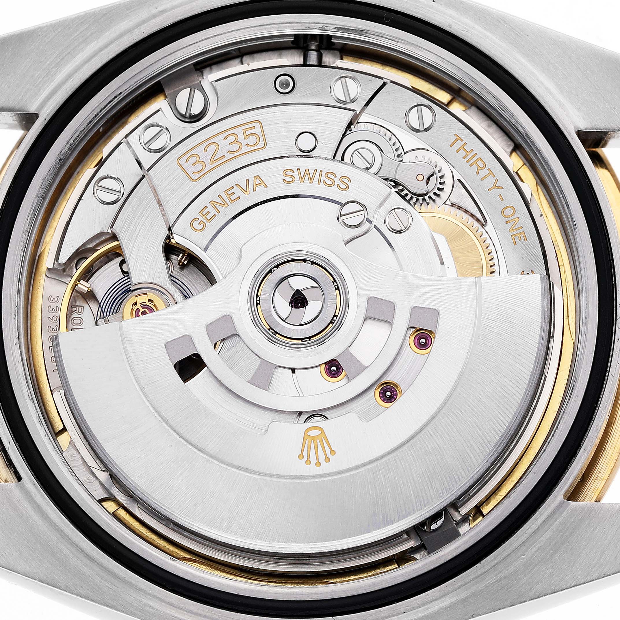 The image shows the movement of a Rolex Datejust 41 126333 Men's Steel and Gold (two tone) Champagne Dial, highlighting the oscillating rotor and internal mechanics.