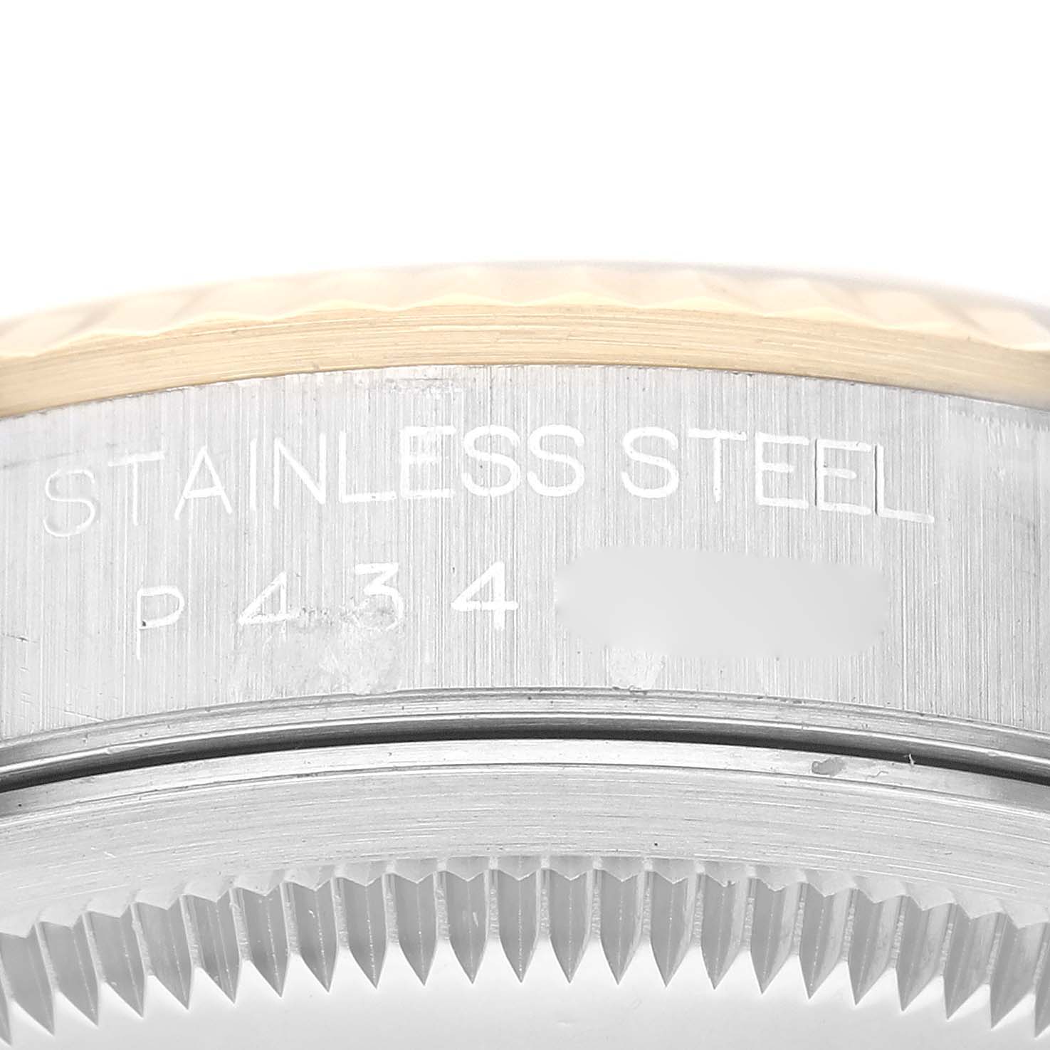 The image shows a close-up of the side of a Rolex Datejust 16233 Men's Steel and Gold (two tone) Champagne Dial 16233 Men's Steel and Gold (two tone) Champagne Dial watch, featuring the stainless steel case and part of the bezel.