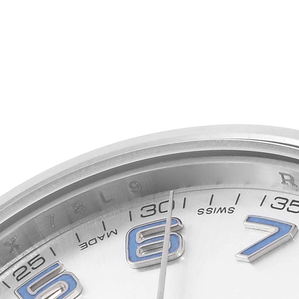 The image shows a close-up of the dial and part of the bezel of the Rolex Datejust 41 116300 Men's Stainless Steel Silver Dial, highlighting numbers and markings.