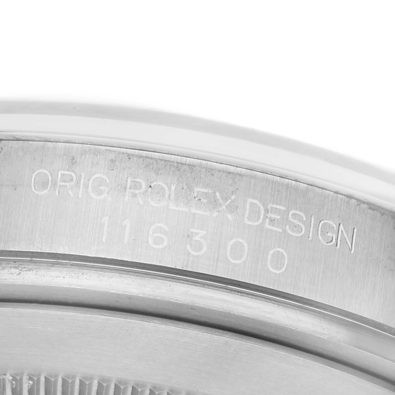 The image shows a close-up of the side of a Rolex Datejust 41 116300 Men's Stainless Steel Silver Dial, highlighting the engraved model details.