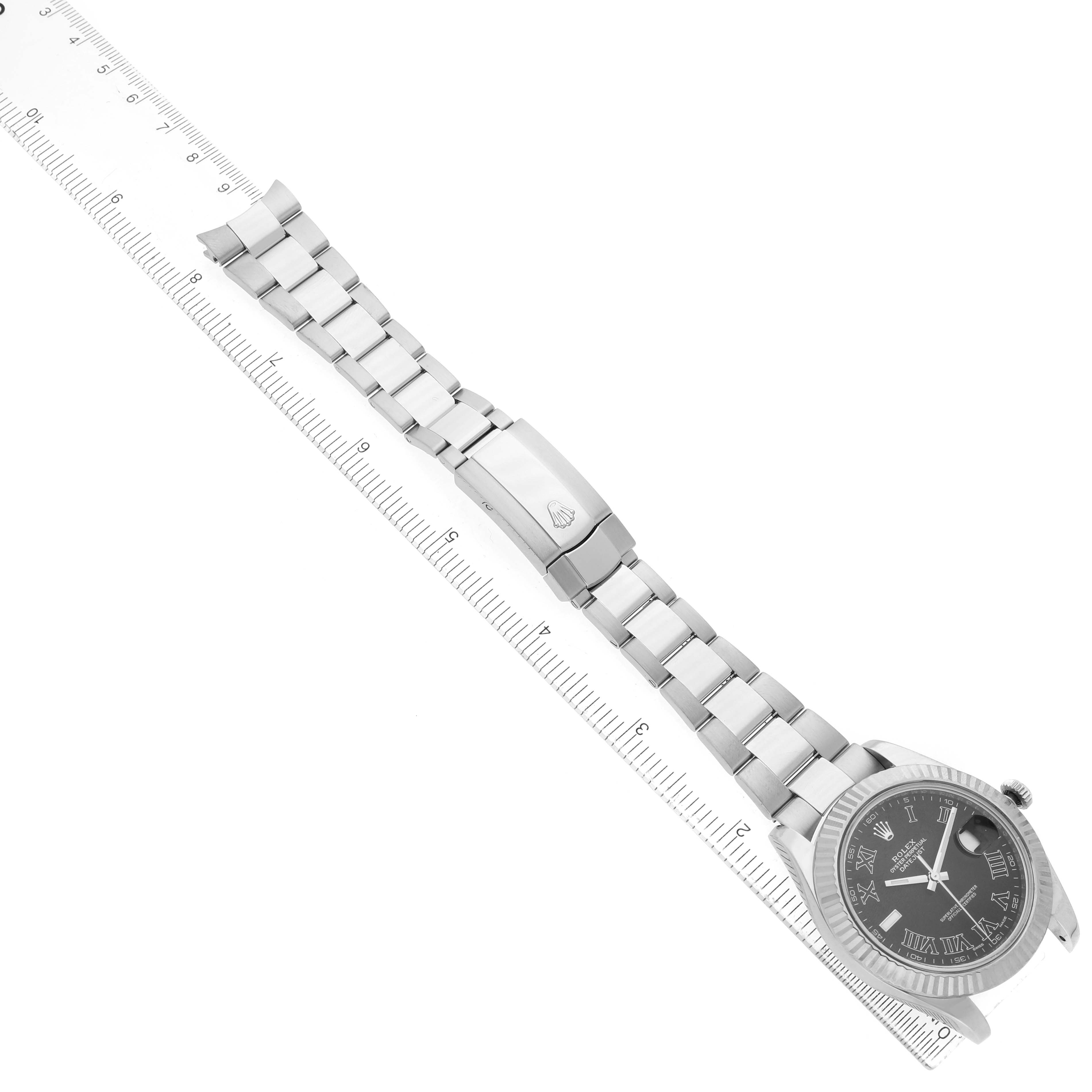 The Rolex Datejust 41 116334 Men's Stainless Steel Black Dial is shown from an angled side view, highlighting the bracelet, clasp, and face.