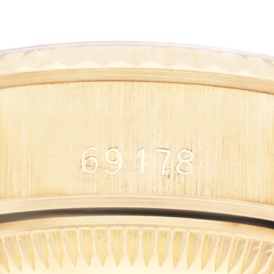 This close-up image shows the model number engraving on the side of the case for a Rolex President 69178 Women's Yellow Gold Champagne Dial 69178 Women's Yellow Gold Champagne Dial model watch.