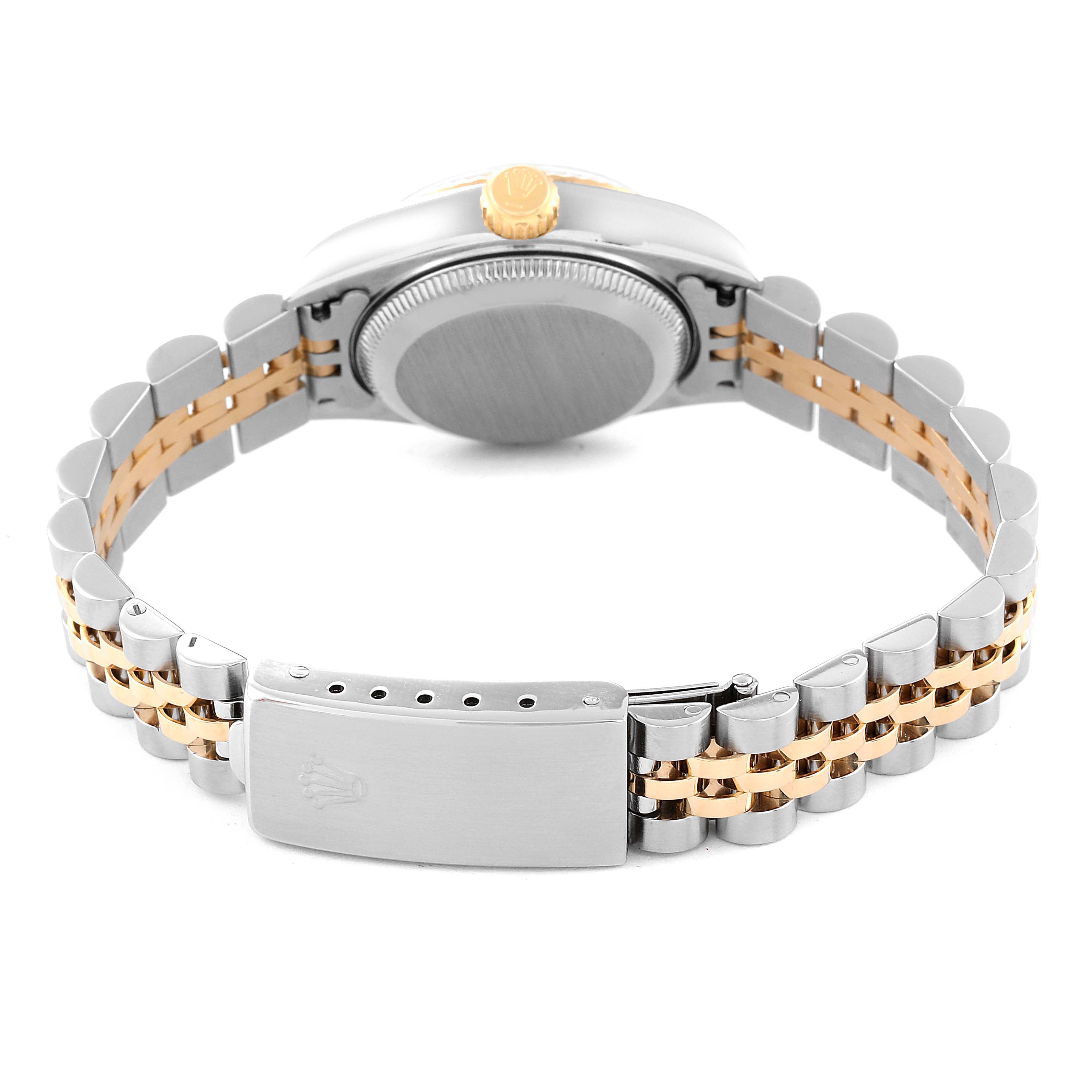 This image shows the Rolex Datejust 79173 Women's Steel and Gold (two tone) Silver Dial 79173 Women's Steel and Gold (two tone) Silver Dial watch from the back, focusing on the bracelet, clasp, and case back.