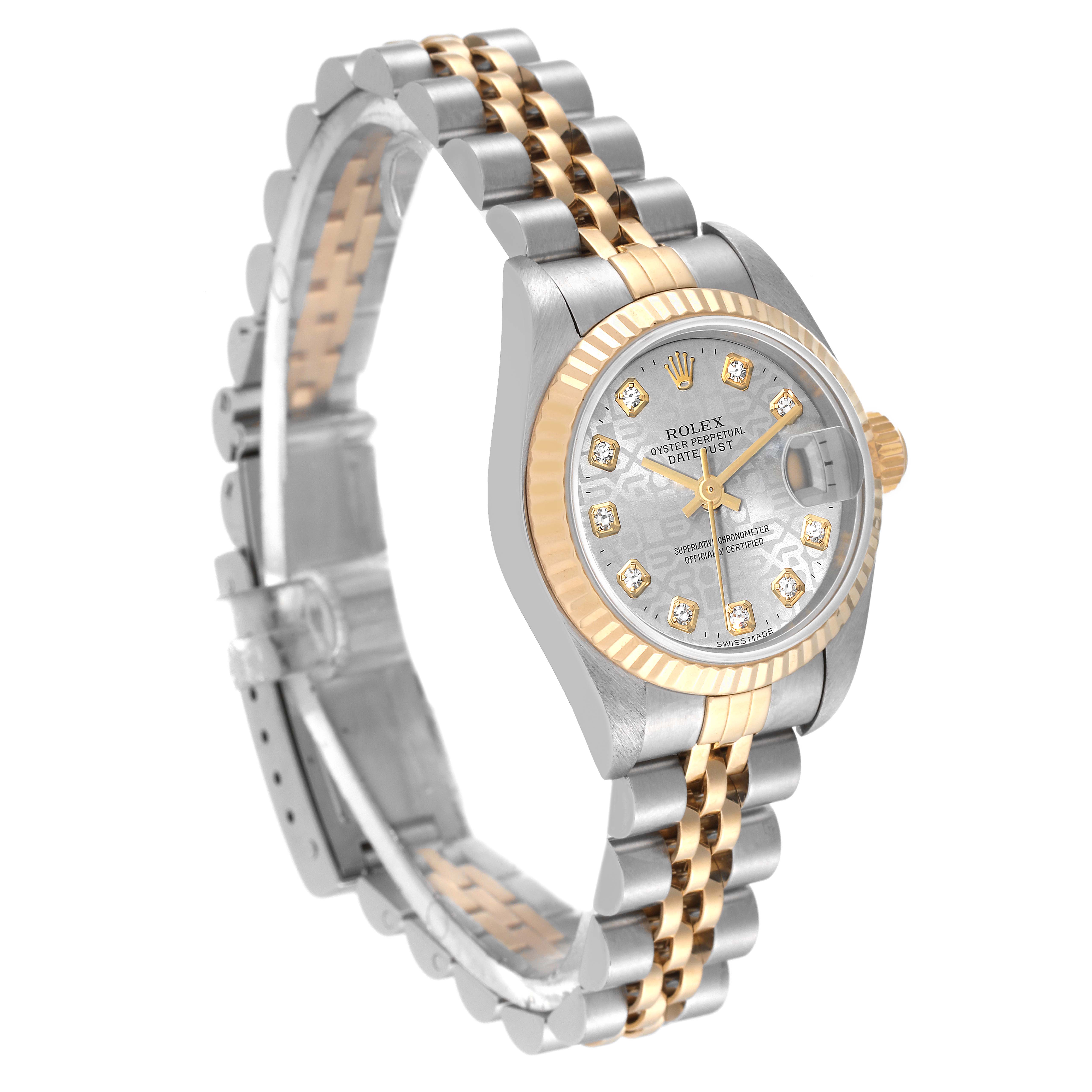 The Rolex Datejust 79173 Women's Steel and Gold (two tone) Silver Dial 79173 Women's Steel and Gold (two tone) Silver Dial watch is shown at a three-quarter angle, highlighting its face, bezel, and two-tone bracelet.