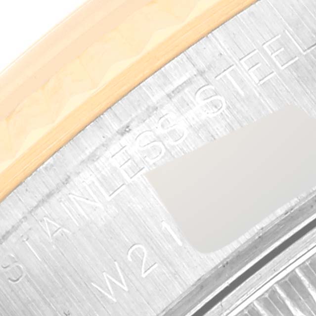 This close-up image shows the engraved text on the stainless steel back of a Rolex Datejust 69173 Women's Steel and Gold (two tone) Black Dial 69173 Women's Steel and Gold (two tone) Black Dial watch.